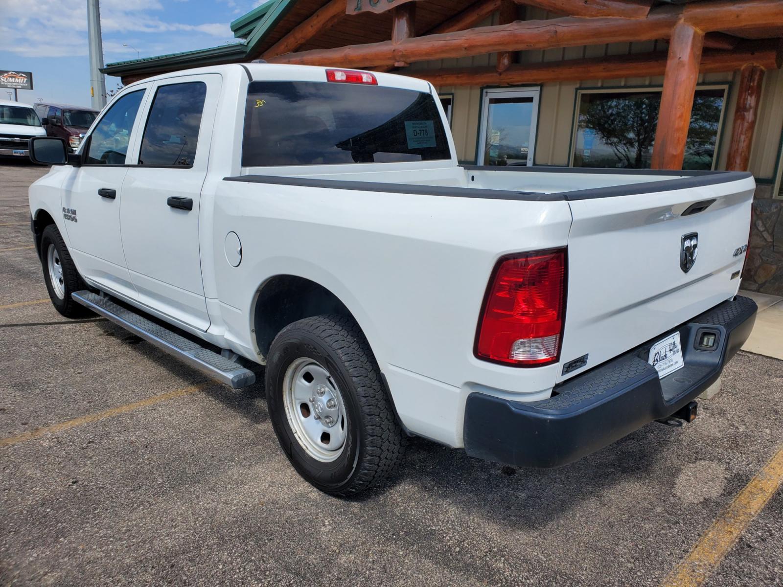 2014 White /Gray Ram 1500 Tradesman (1C6RR7KG2ES) with an 3.6L V-6 24V VVT engine, 8-Speed Automtic transmission, located at 1600 E Hwy 44, Rapid City, SD, 57703, (605) 716-7878, 44.070232, -103.171410 - Photo #5