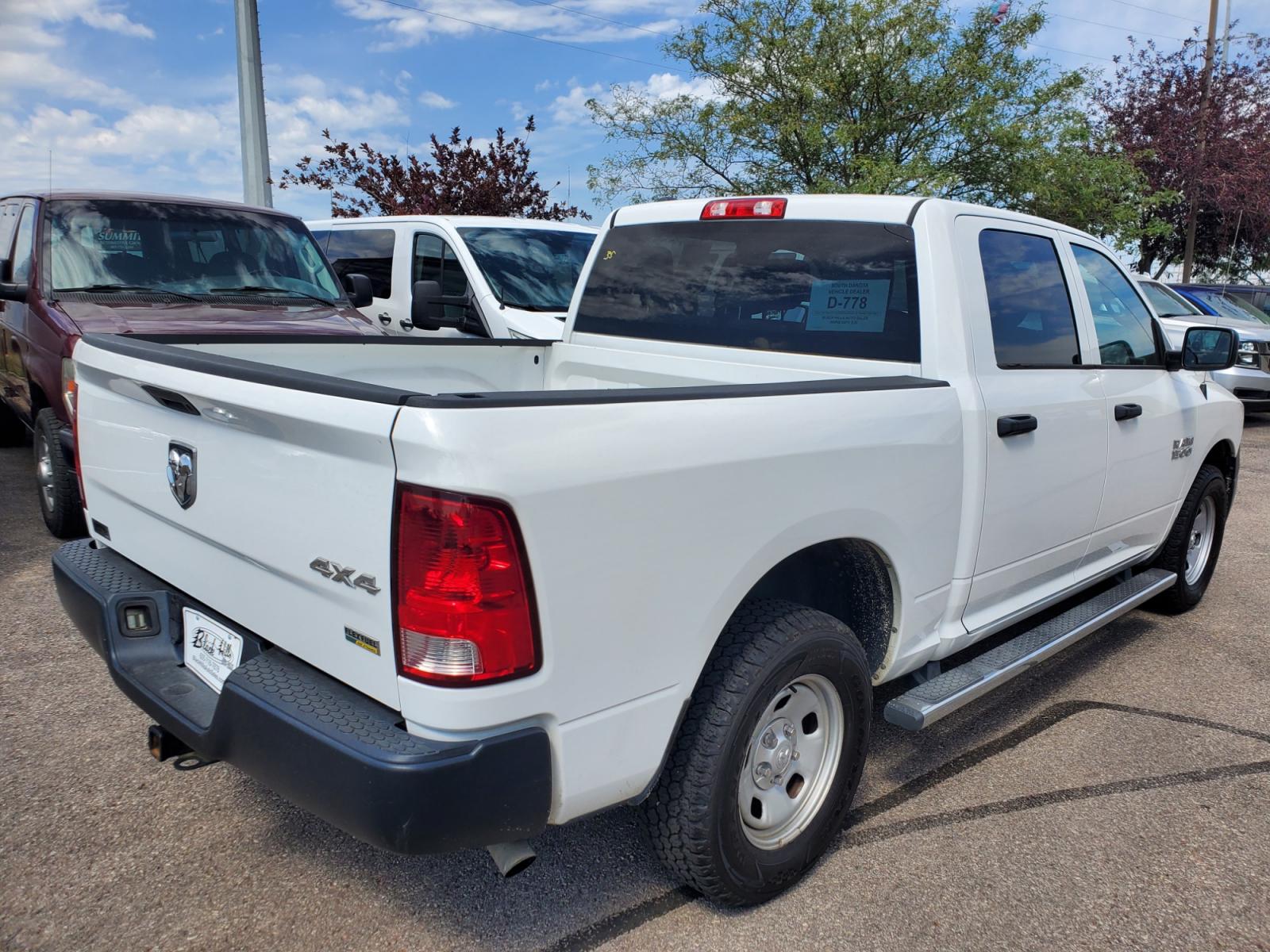 2014 White /Gray Ram 1500 Tradesman (1C6RR7KG2ES) with an 3.6L V-6 24V VVT engine, 8-Speed Automtic transmission, located at 1600 E Hwy 44, Rapid City, SD, 57703, (605) 716-7878, 44.070232, -103.171410 - Photo #7