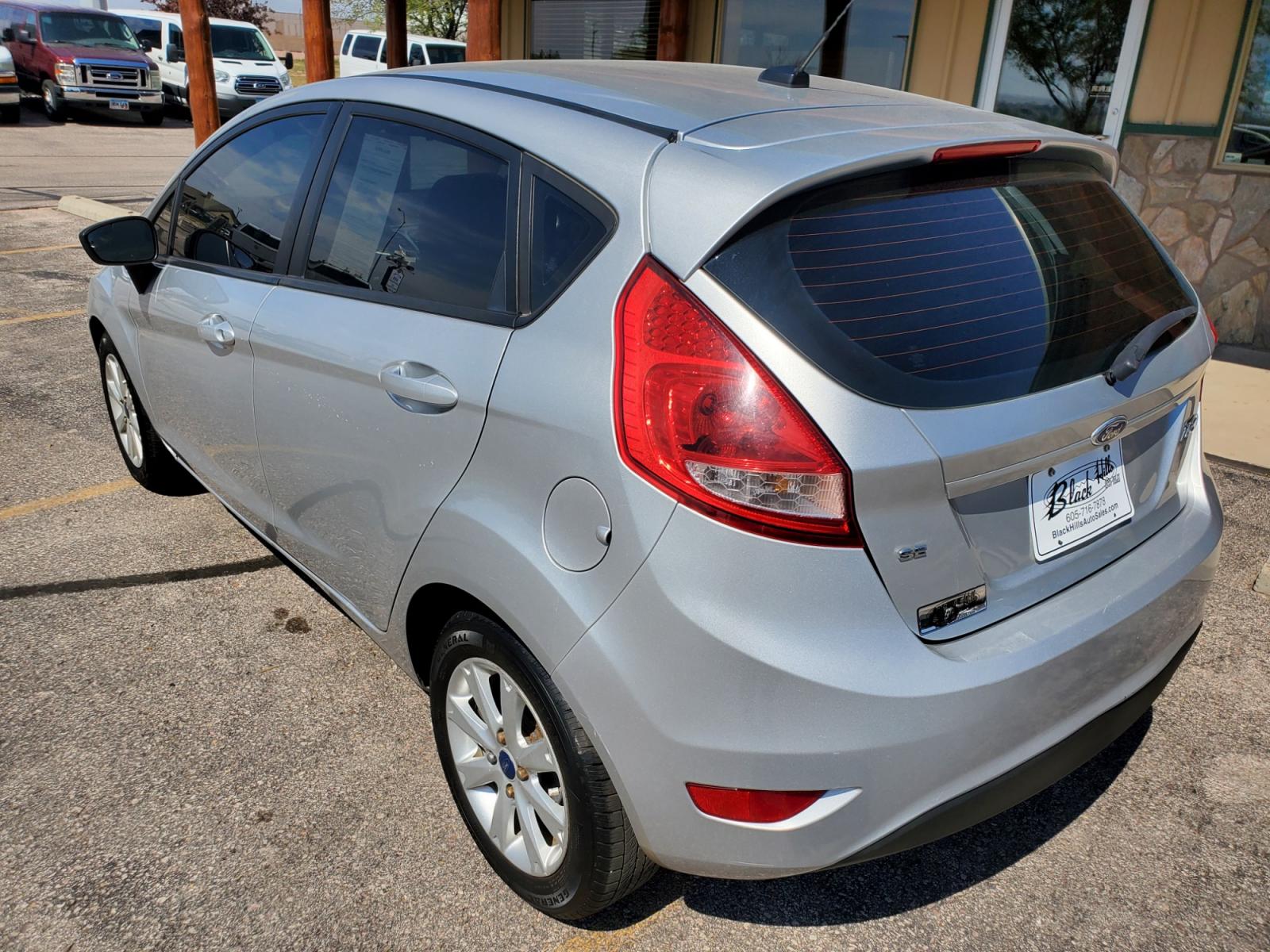 2012 Silver /Black Ford Fiesta SE (3FADP4EJ5CM) with an 1.6l 4Cyl TI-VCT engine, 6-Speed Poweshift transmission, located at 1600 E Hwy 44, Rapid City, SD, 57703, (605) 716-7878, 44.070232, -103.171410 - Photo #5