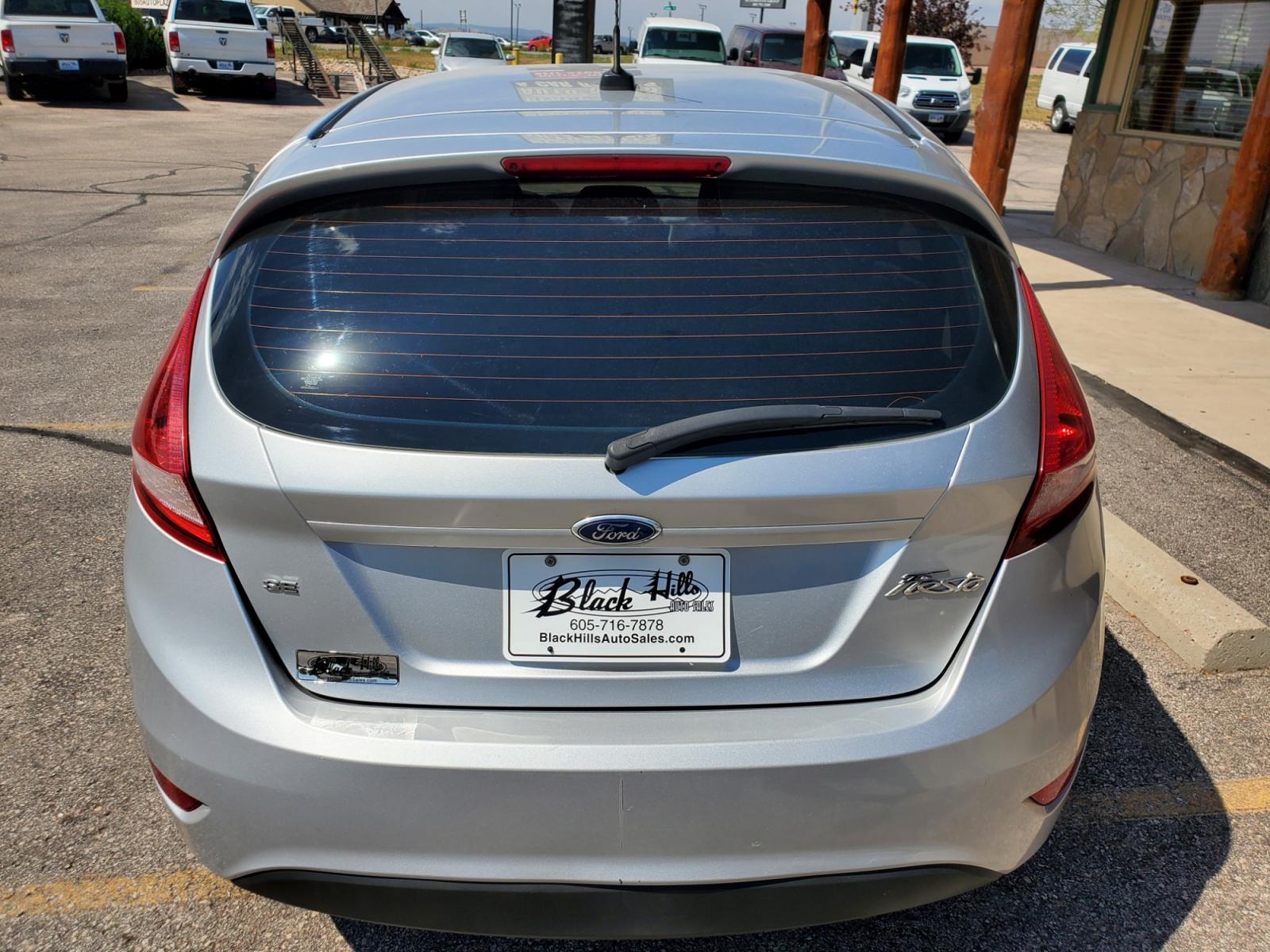 2012 Silver /Black Ford Fiesta SE (3FADP4EJ5CM) with an 1.6l 4Cyl TI-VCT engine, 6-Speed Poweshift transmission, located at 1600 E Hwy 44, Rapid City, SD, 57703, (605) 716-7878, 44.070232, -103.171410 - Photo #6