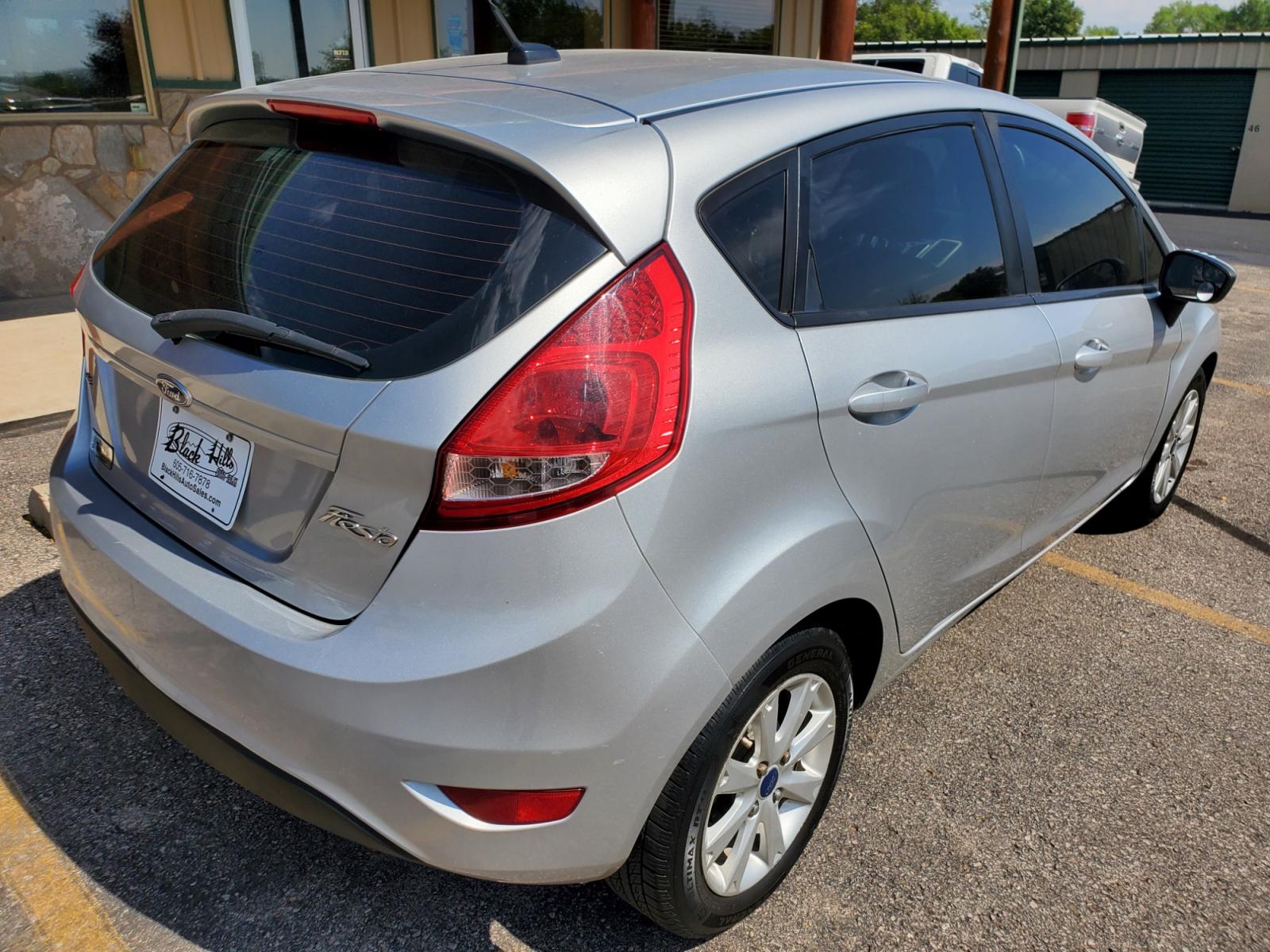 2012 Silver /Black Ford Fiesta SE (3FADP4EJ5CM) with an 1.6l 4Cyl TI-VCT engine, 6-Speed Poweshift transmission, located at 1600 E Hwy 44, Rapid City, SD, 57703, (605) 716-7878, 44.070232, -103.171410 - Photo #7