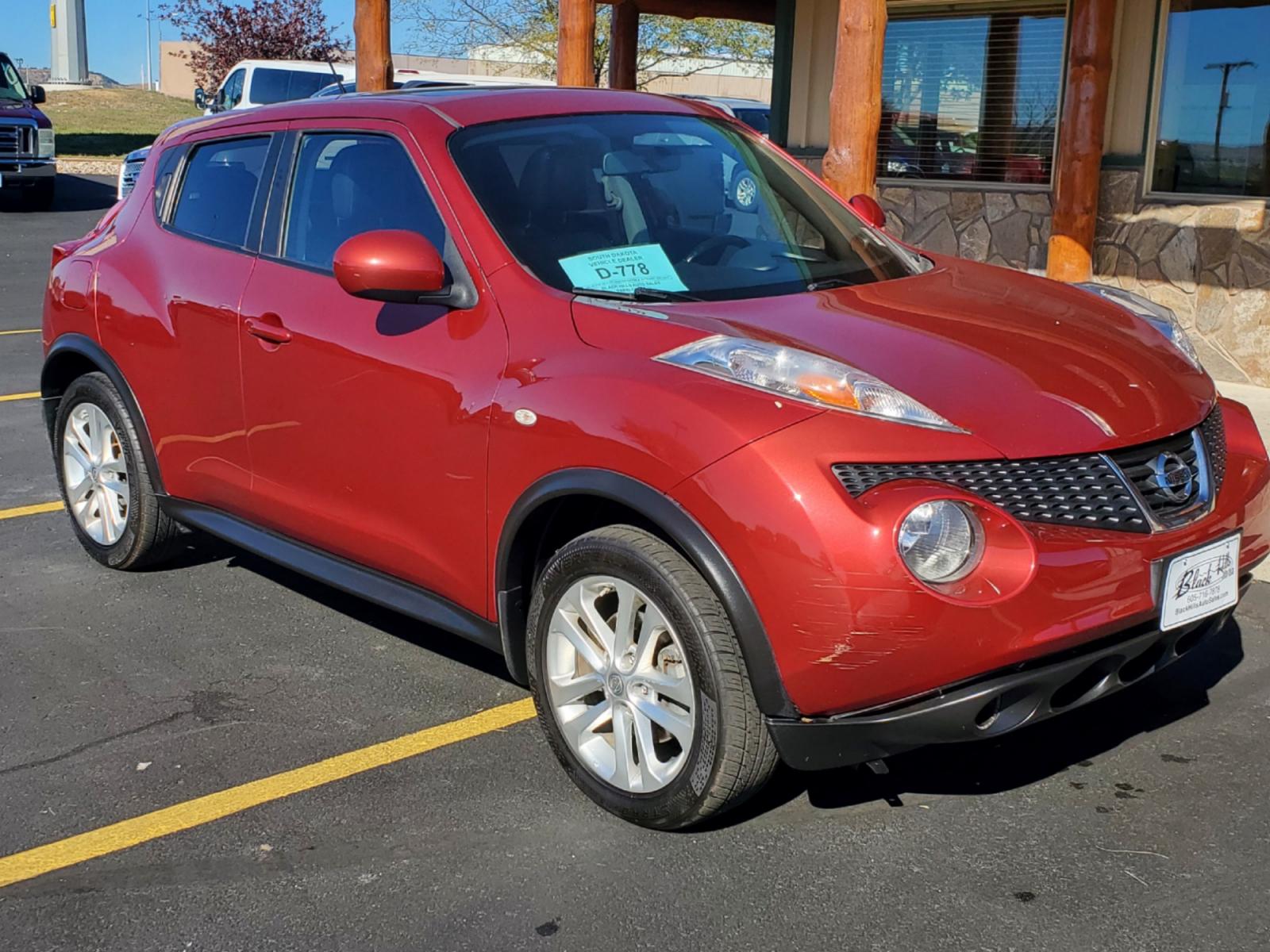 2013 Maroon Nissan Juke SL (JN8AF5MV1DT) with an 1.6L 4 Cyl Turbocharged engine, 1-Speed CVT transmission, located at 1600 E Hwy 44, Rapid City, SD, 57703, (605) 716-7878, 44.070232, -103.171410 - Photo #0