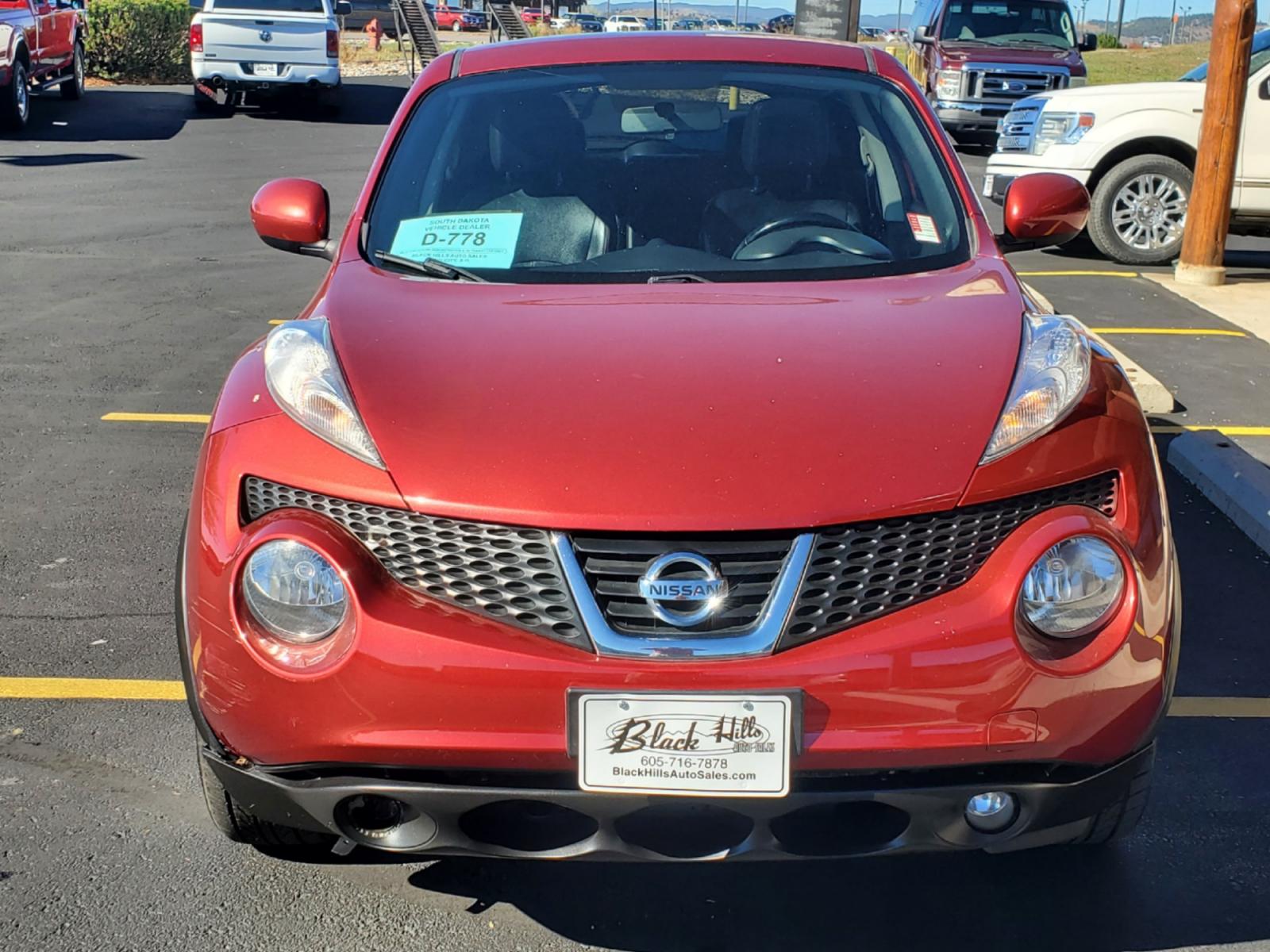 2013 Maroon Nissan Juke SL (JN8AF5MV1DT) with an 1.6L 4 Cyl Turbocharged engine, 1-Speed CVT transmission, located at 1600 E Hwy 44, Rapid City, SD, 57703, (605) 716-7878, 44.070232, -103.171410 - Photo #1
