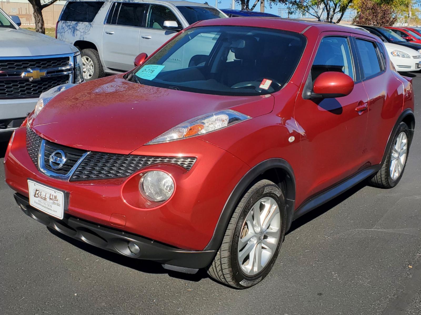 2013 Maroon Nissan Juke SL (JN8AF5MV1DT) with an 1.6L 4 Cyl Turbocharged engine, 1-Speed CVT transmission, located at 1600 E Hwy 44, Rapid City, SD, 57703, (605) 716-7878, 44.070232, -103.171410 - Photo #2