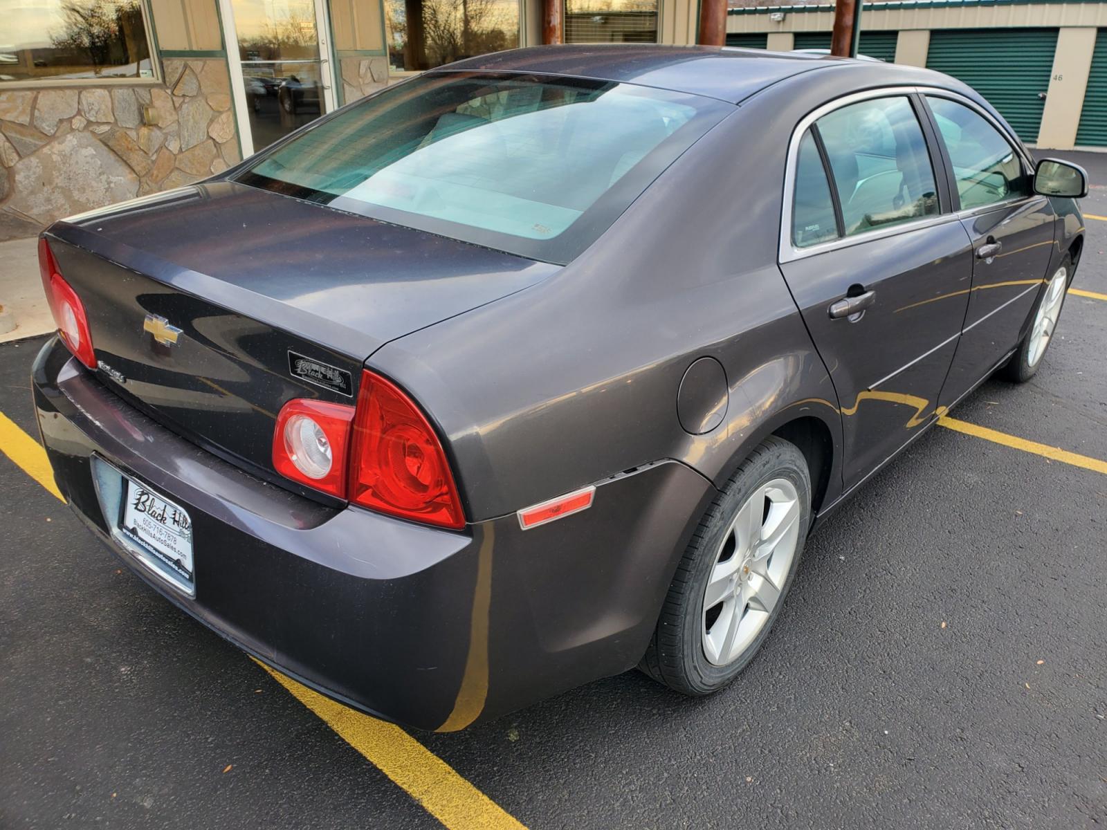 2012 Gray /Lt Gray Chevrolet Malibu LS (1G1ZA5EU9CF) with an 2.4L 4 Cyl Ecotec DOHC 16, Valve Variable Valve Timing, MFI engine, 6-Speed Automatic transmission, located at 1600 E Hwy 44, Rapid City, SD, 57703, (605) 716-7878, 44.070232, -103.171410 - Photo #7