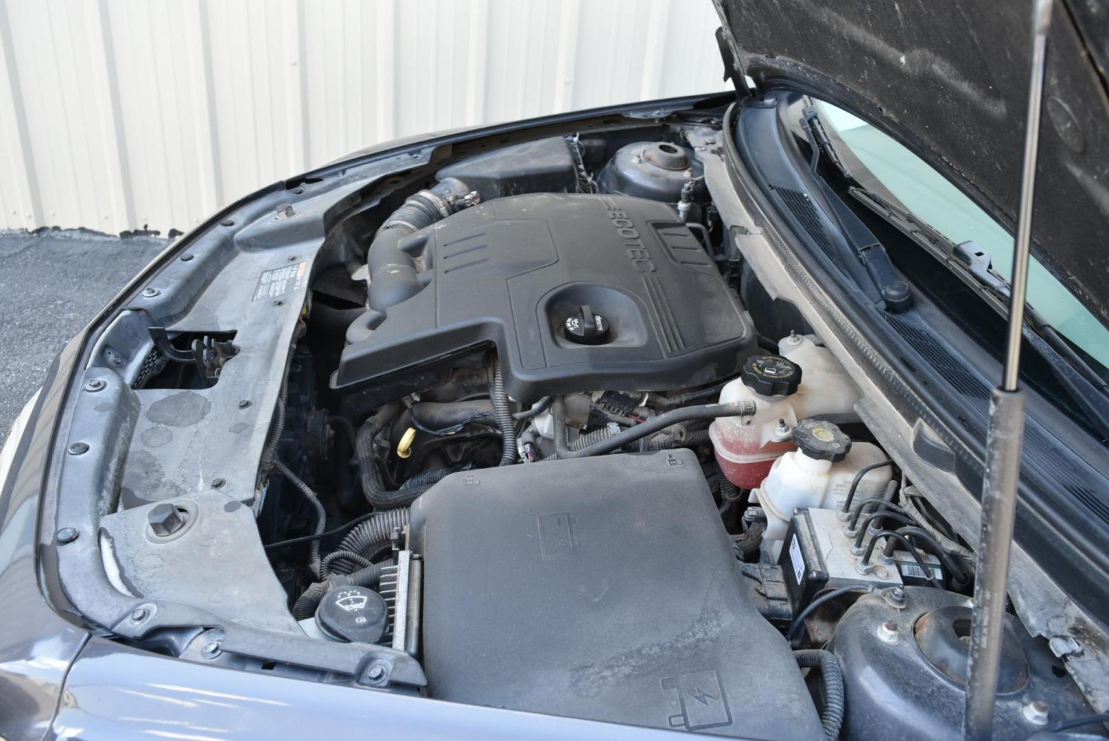 2012 Gray /Lt Gray Chevrolet Malibu LS (1G1ZA5EU9CF) with an 2.4L 4 Cyl Ecotec DOHC 16, Valve Variable Valve Timing, MFI engine, 6-Speed Automatic transmission, located at 1600 E Hwy 44, Rapid City, SD, 57703, (605) 716-7878, 44.070232, -103.171410 - Photo#23