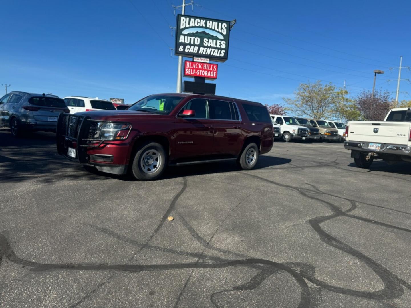 2019 Maroon /Black Chevrolet Suburban LS Fleet (1GNSKKKCXKR) with an 5.3L V-8 engine, 6-Speed Automatic transmission, located at 1600 E Hwy 44, Rapid City, SD, 57703, (605) 716-7878, 44.070232, -103.171410 - Photo#0