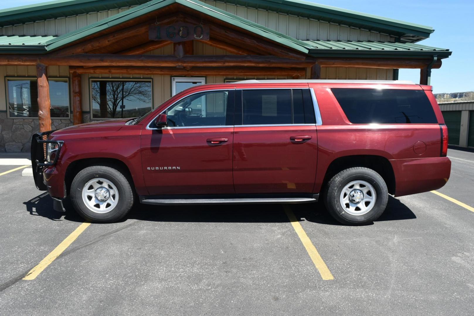 2019 Maroon /Black Chevrolet Suburban LS Fleet (1GNSKKKCXKR) with an 5.3L V-8 engine, 6-Speed Automatic transmission, located at 1600 E Hwy 44, Rapid City, SD, 57703, (605) 716-7878, 44.070232, -103.171410 - Photo#4