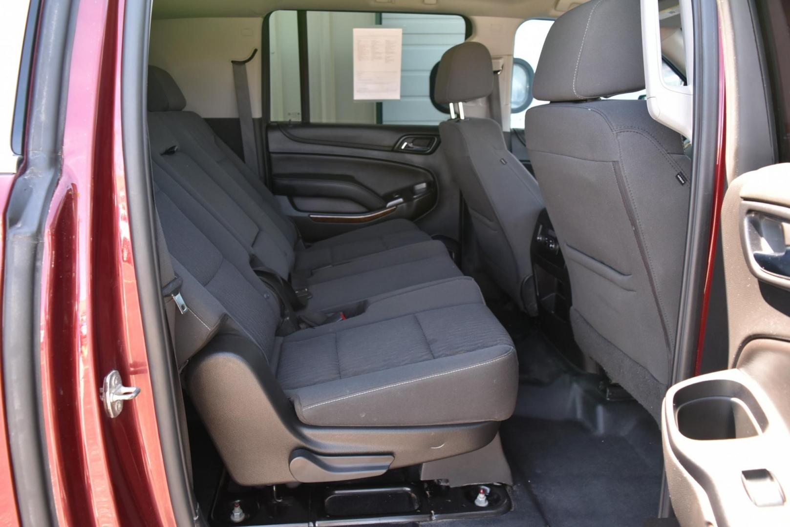 2019 Maroon /Black Chevrolet Suburban LS Fleet (1GNSKKKCXKR) with an 5.3L V-8 engine, 6-Speed Automatic transmission, located at 1600 E Hwy 44, Rapid City, SD, 57703, (605) 716-7878, 44.070232, -103.171410 - Photo#11