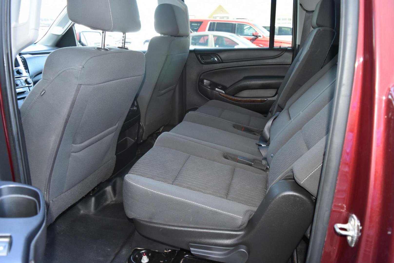 2019 Maroon /Black Chevrolet Suburban LS Fleet (1GNSKKKCXKR) with an 5.3L V-8 engine, 6-Speed Automatic transmission, located at 1600 E Hwy 44, Rapid City, SD, 57703, (605) 716-7878, 44.070232, -103.171410 - Photo#14