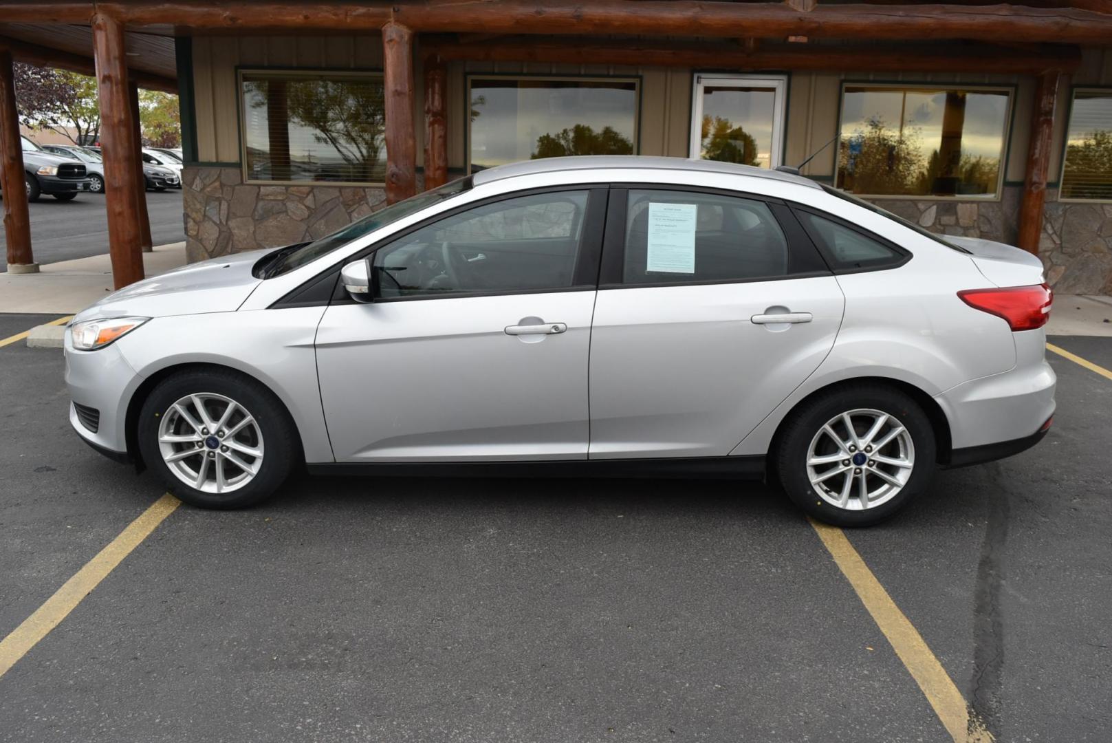 2016 Silver Ford Focus SE (1FADP3F21GL) with an 2.0L I-4 GDI TI-VCT engine, 6-Speed Powershift Automatic transmission, located at 1600 E Hwy 44, Rapid City, SD, 57703, (605) 716-7878, 44.070232, -103.171410 - Photo#3