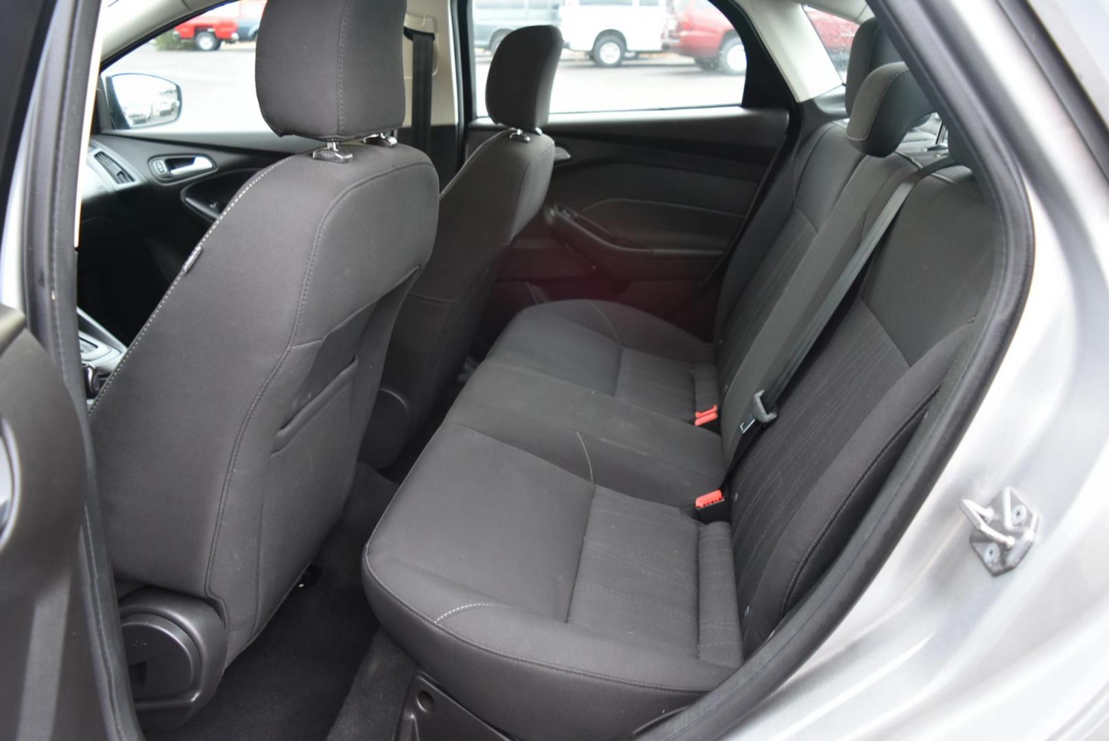 2016 Silver Ford Focus SE (1FADP3F21GL) with an 2.0L I-4 GDI TI-VCT engine, 6-Speed Powershift Automatic transmission, located at 1600 E Hwy 44, Rapid City, SD, 57703, (605) 716-7878, 44.070232, -103.171410 - Photo#11