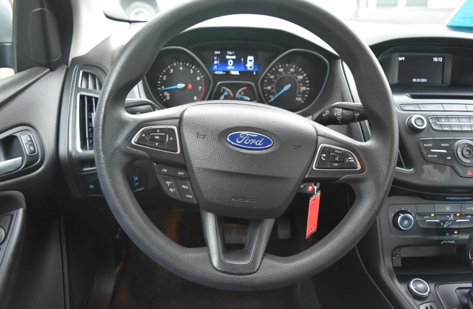 2016 Silver Ford Focus SE (1FADP3F21GL) with an 2.0L I-4 GDI TI-VCT engine, 6-Speed Powershift Automatic transmission, located at 1600 E Hwy 44, Rapid City, SD, 57703, (605) 716-7878, 44.070232, -103.171410 - Photo#13