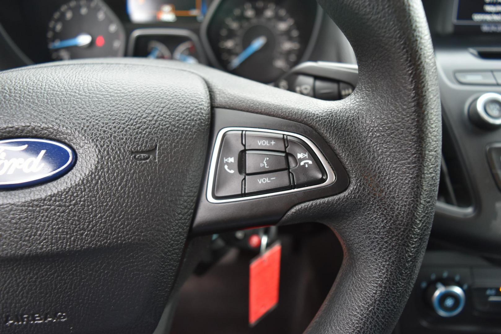 2016 Silver Ford Focus SE (1FADP3F21GL) with an 2.0L I-4 GDI TI-VCT engine, 6-Speed Powershift Automatic transmission, located at 1600 E Hwy 44, Rapid City, SD, 57703, (605) 716-7878, 44.070232, -103.171410 - Photo#16