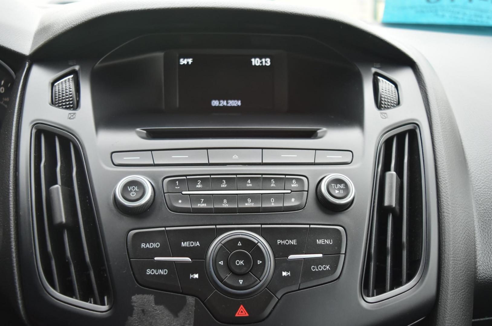 2016 Silver Ford Focus SE (1FADP3F21GL) with an 2.0L I-4 GDI TI-VCT engine, 6-Speed Powershift Automatic transmission, located at 1600 E Hwy 44, Rapid City, SD, 57703, (605) 716-7878, 44.070232, -103.171410 - Photo#18