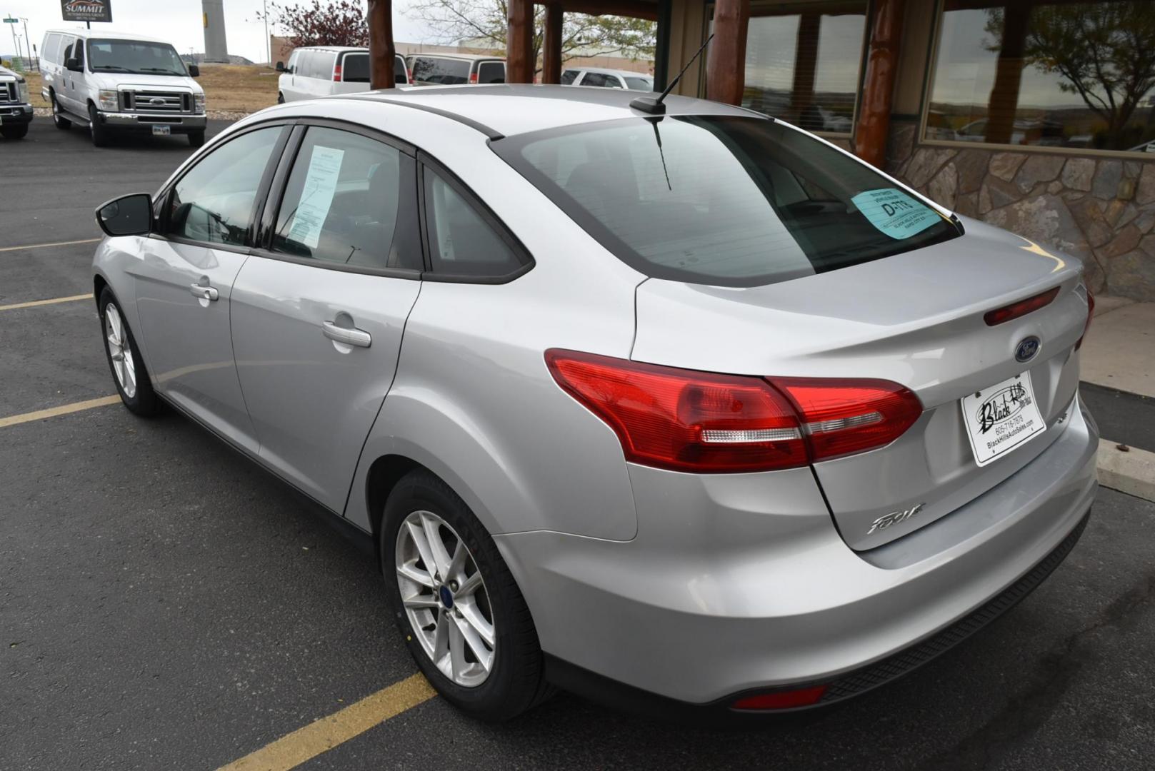 2016 Silver Ford Focus SE (1FADP3F21GL) with an 2.0L I-4 GDI TI-VCT engine, 6-Speed Powershift Automatic transmission, located at 1600 E Hwy 44, Rapid City, SD, 57703, (605) 716-7878, 44.070232, -103.171410 - Photo#5