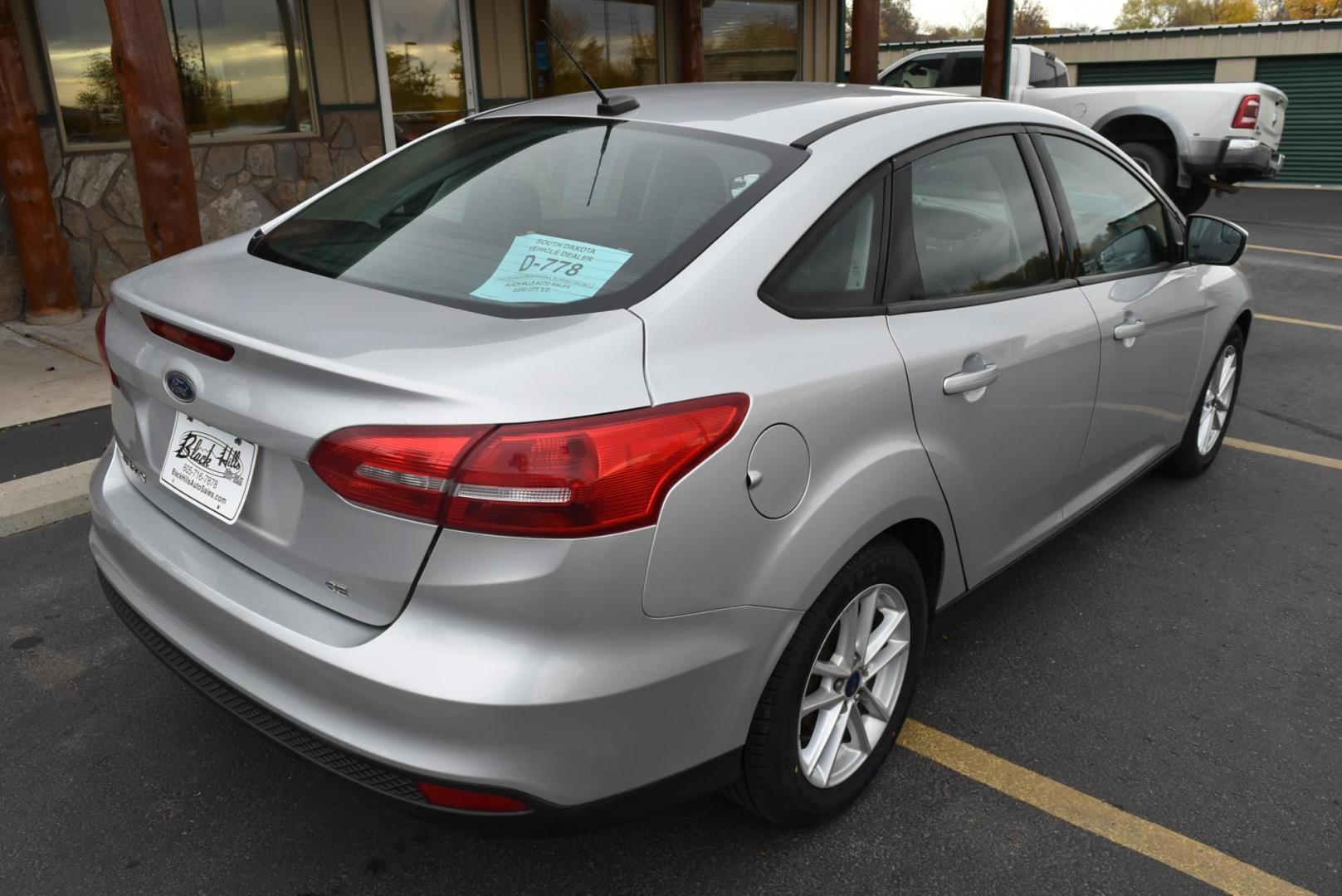 2016 Silver Ford Focus SE (1FADP3F21GL) with an 2.0L I-4 GDI TI-VCT engine, 6-Speed Powershift Automatic transmission, located at 1600 E Hwy 44, Rapid City, SD, 57703, (605) 716-7878, 44.070232, -103.171410 - Photo#7
