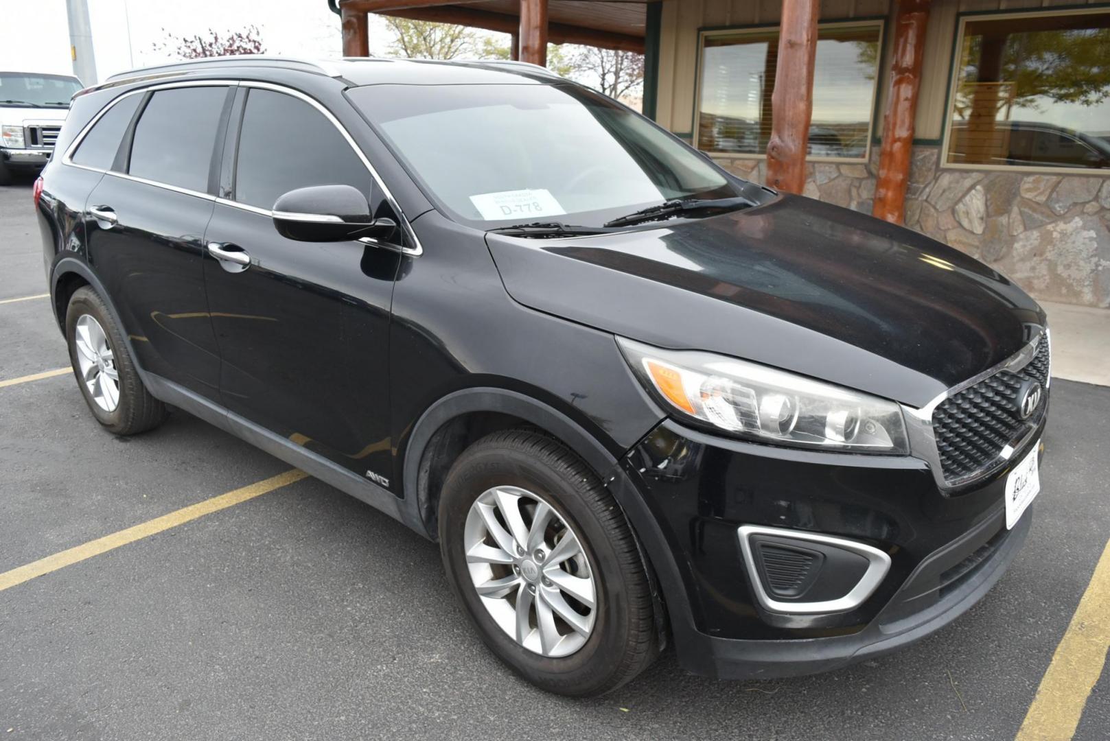 2017 Black Kia Sorento LX (5XYPGDA37HG) with an 2.4L 4 Cyl engine, 6-Speed Automatic w/OD transmission, located at 1600 E Hwy 44, Rapid City, SD, 57703, (605) 716-7878, 44.070232, -103.171410 - Photo#0