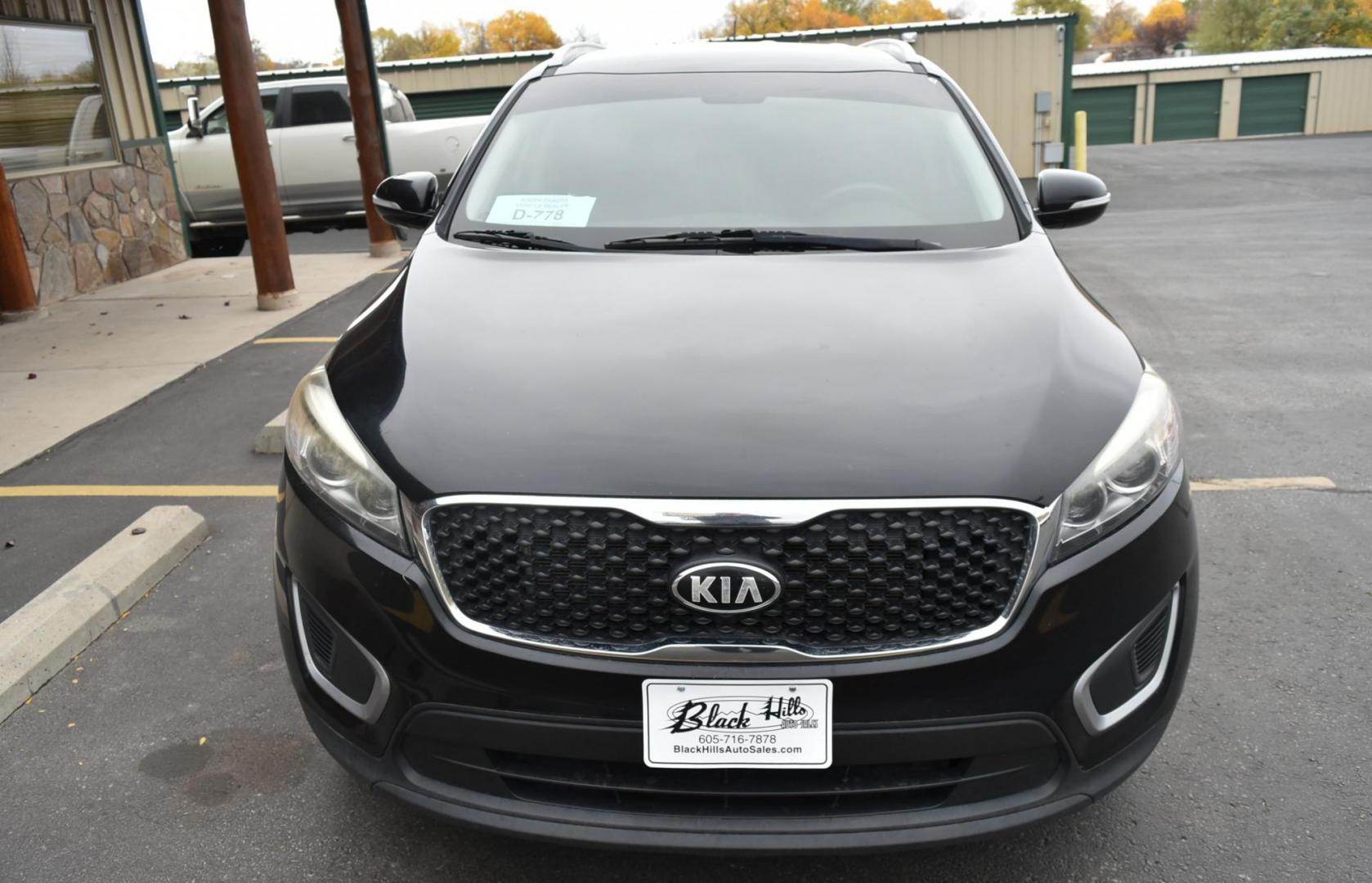 2017 Black Kia Sorento LX (5XYPGDA37HG) with an 2.4L 4 Cyl engine, 6-Speed Automatic w/OD transmission, located at 1600 E Hwy 44, Rapid City, SD, 57703, (605) 716-7878, 44.070232, -103.171410 - Photo#1