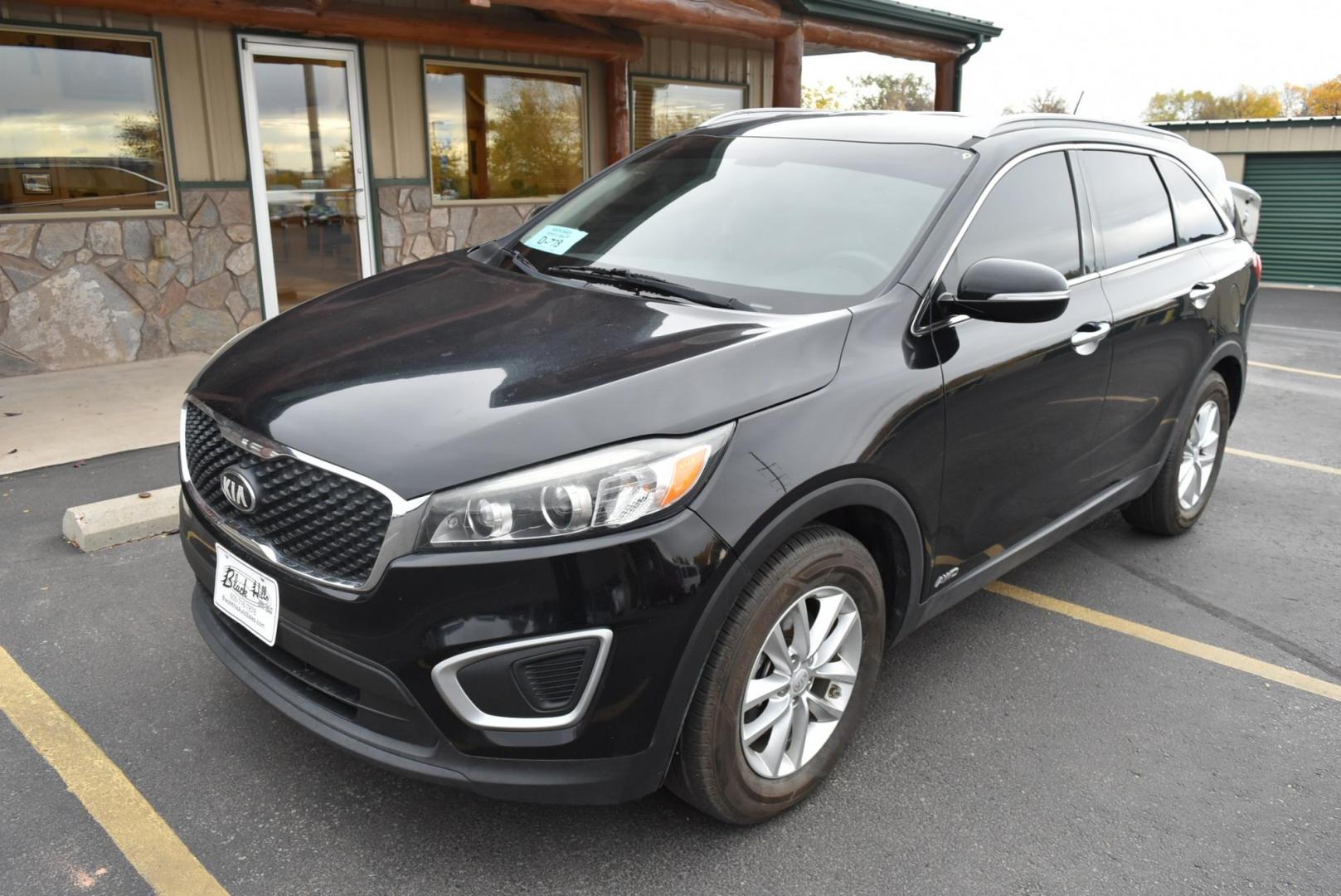 2017 Black Kia Sorento LX (5XYPGDA37HG) with an 2.4L 4 Cyl engine, 6-Speed Automatic w/OD transmission, located at 1600 E Hwy 44, Rapid City, SD, 57703, (605) 716-7878, 44.070232, -103.171410 - Photo#2