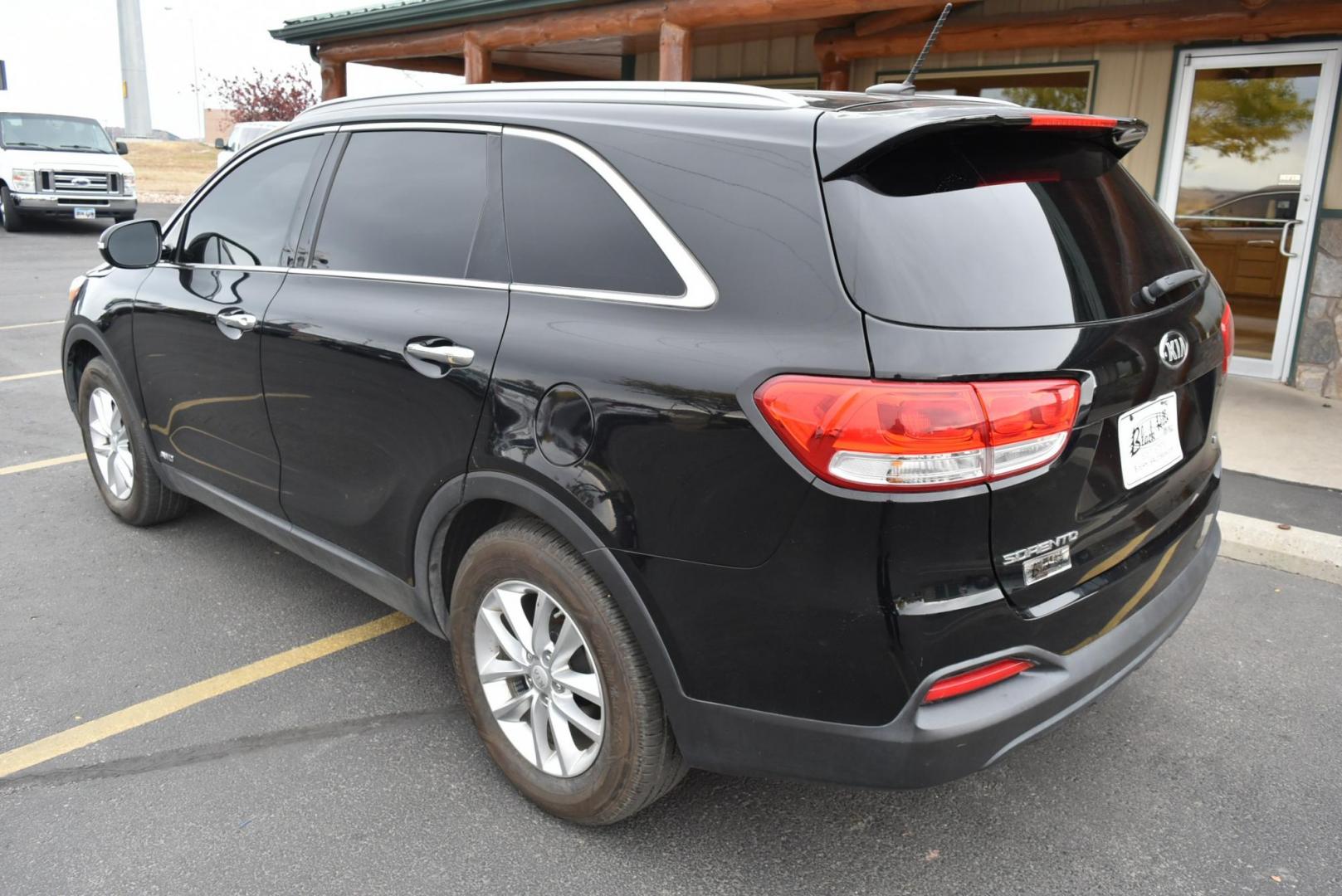 2017 Black Kia Sorento LX (5XYPGDA37HG) with an 2.4L 4 Cyl engine, 6-Speed Automatic w/OD transmission, located at 1600 E Hwy 44, Rapid City, SD, 57703, (605) 716-7878, 44.070232, -103.171410 - Photo#5