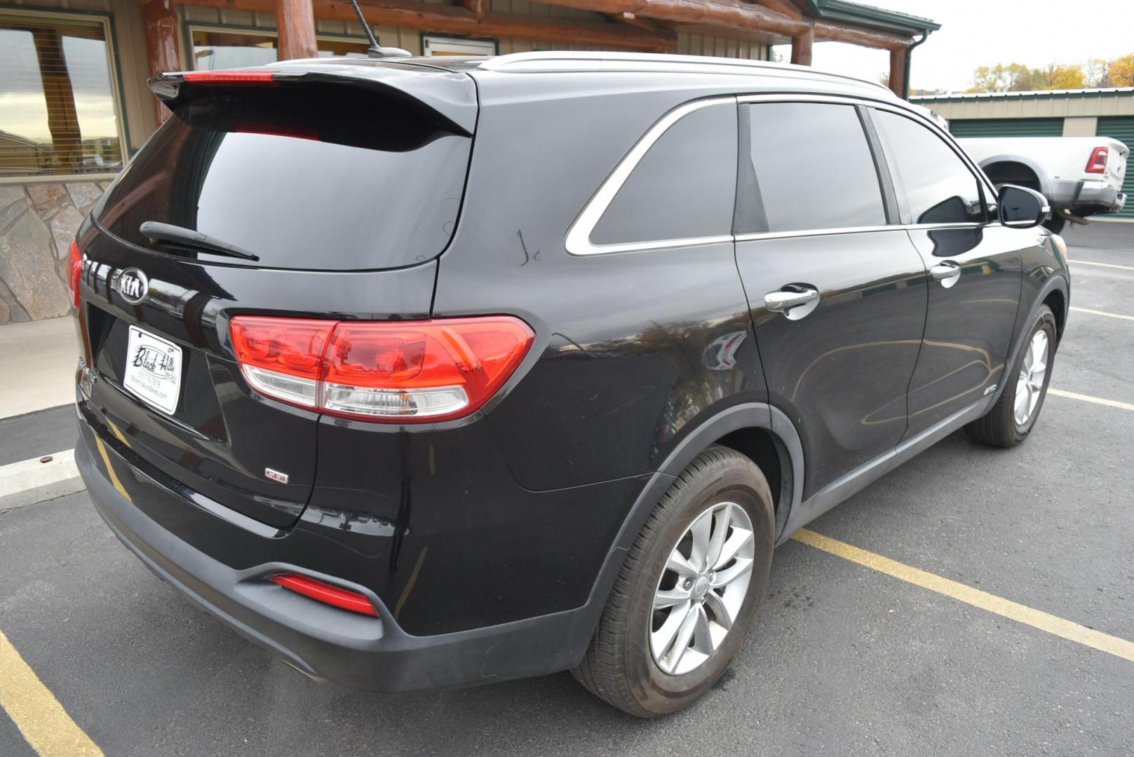 2017 Black Kia Sorento LX (5XYPGDA37HG) with an 2.4L 4 Cyl engine, 6-Speed Automatic w/OD transmission, located at 1600 E Hwy 44, Rapid City, SD, 57703, (605) 716-7878, 44.070232, -103.171410 - Photo#7