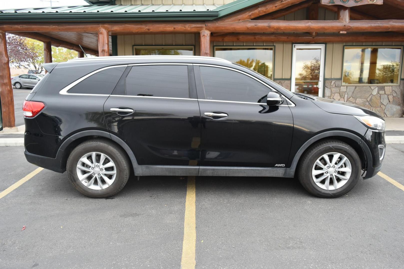 2017 Black Kia Sorento LX (5XYPGDA37HG) with an 2.4L 4 Cyl engine, 6-Speed Automatic w/OD transmission, located at 1600 E Hwy 44, Rapid City, SD, 57703, (605) 716-7878, 44.070232, -103.171410 - Photo#4