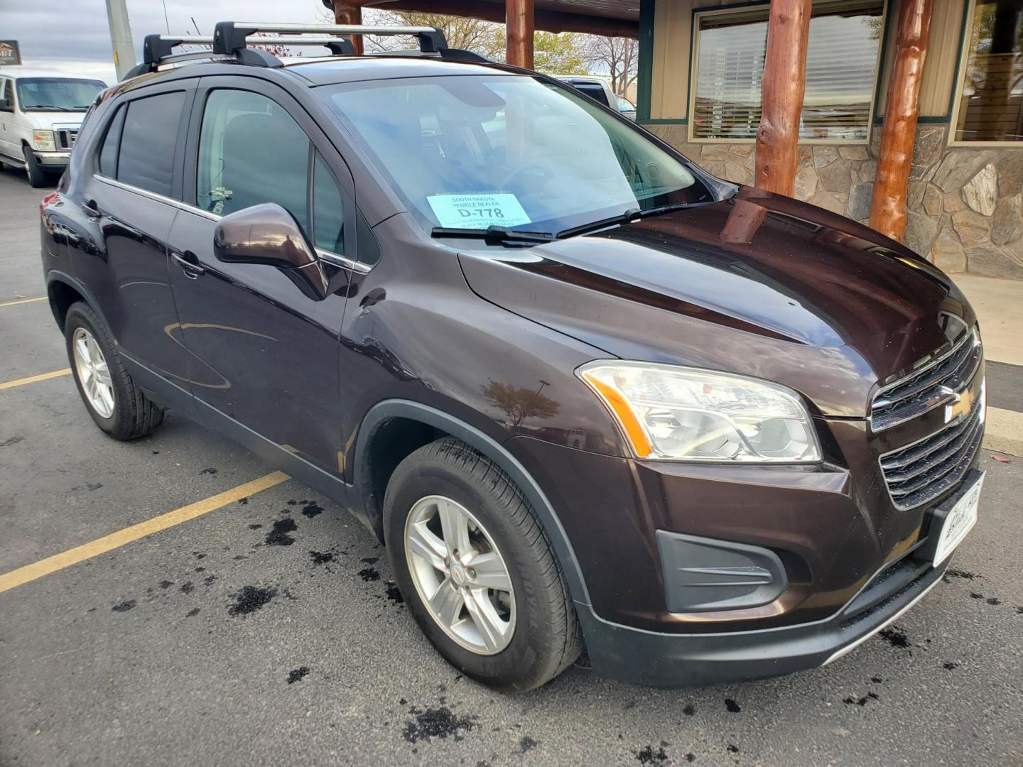 2016 Brown /Black Chevrolet Trax LT (KL7CJPSB9GB) with an 1.4L 4 Cyl Turbo engine, 6-Speed Automatic transmission, located at 1600 E Hwy 44, Rapid City, SD, 57703, (605) 716-7878, 44.070232, -103.171410 - Photo#0