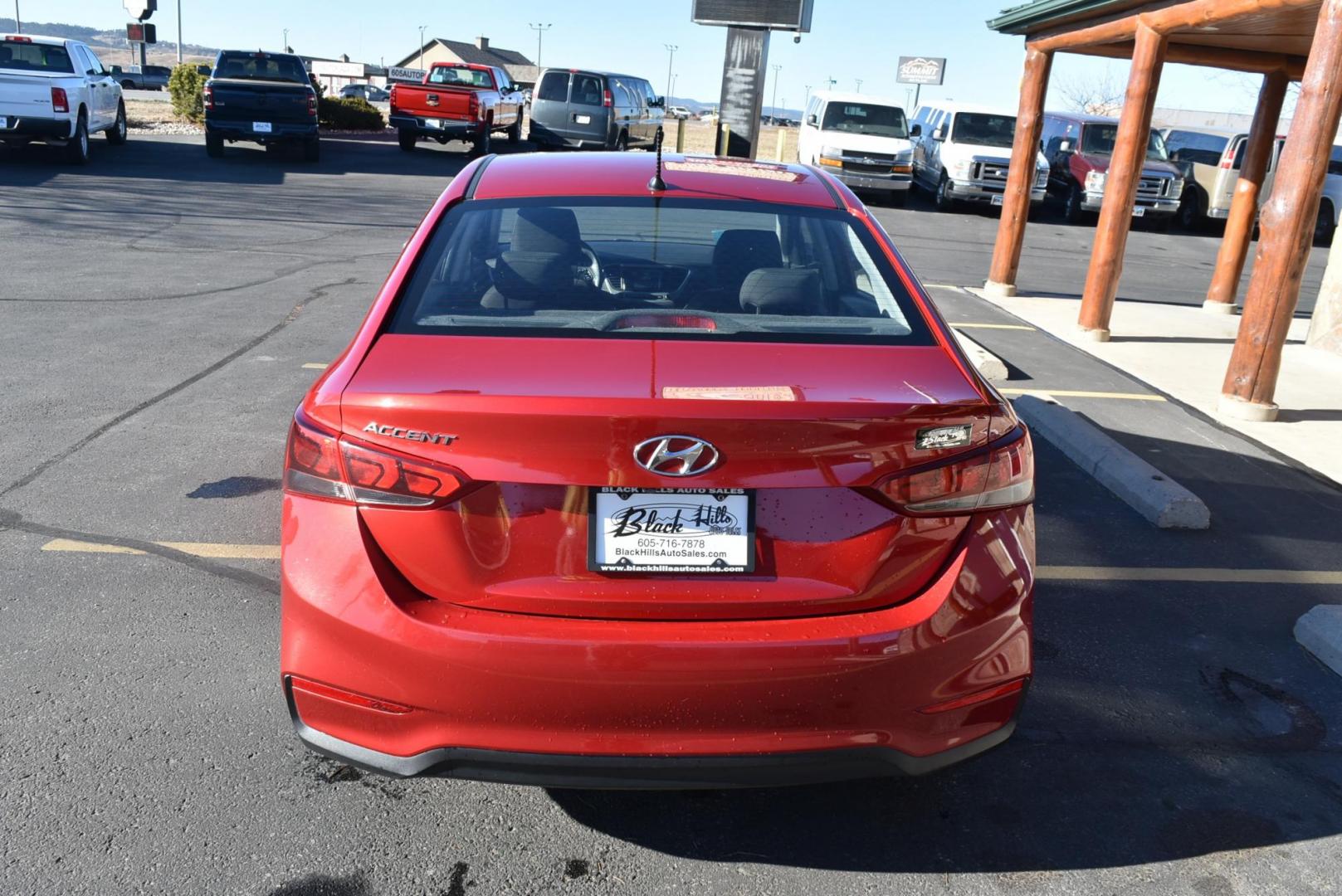 2018 Red /Gray Hyundai Accent SE (3KPC24A36JE) with an 1.6L 4 Cyl engine, 6-Speed Automatic transmission, located at 1600 E Hwy 44, Rapid City, SD, 57703, (605) 716-7878, 44.070232, -103.171410 - Photo#6