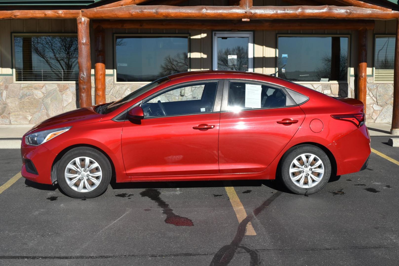 2018 Red /Gray Hyundai Accent SE (3KPC24A36JE) with an 1.6L 4 Cyl engine, 6-Speed Automatic transmission, located at 1600 E Hwy 44, Rapid City, SD, 57703, (605) 716-7878, 44.070232, -103.171410 - Photo#3