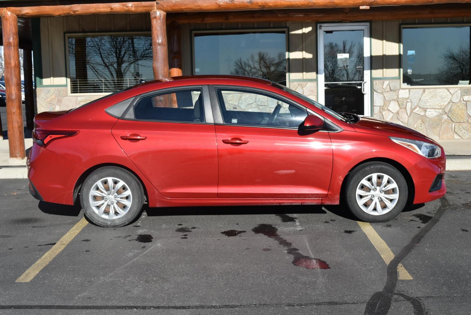2018 Red /Gray Hyundai Accent SE (3KPC24A36JE) with an 1.6L 4 Cyl engine, 6-Speed Automatic transmission, located at 1600 E Hwy 44, Rapid City, SD, 57703, (605) 716-7878, 44.070232, -103.171410 - Photo#4