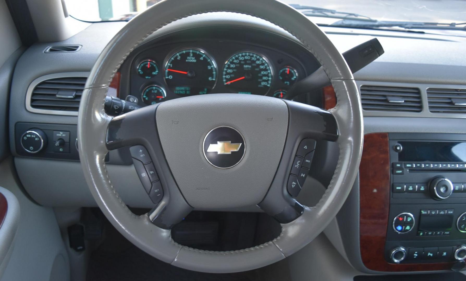2009 Maroon /Tan Chevrolet Suburban LT (1GNFK26339J) with an 5.3L Vortec V8 SFI with Active Fuel Management engine, 6-Speed Automatic transmission, located at 1600 E Hwy 44, Rapid City, SD, 57703, (605) 716-7878, 44.070232, -103.171410 - Photo#18
