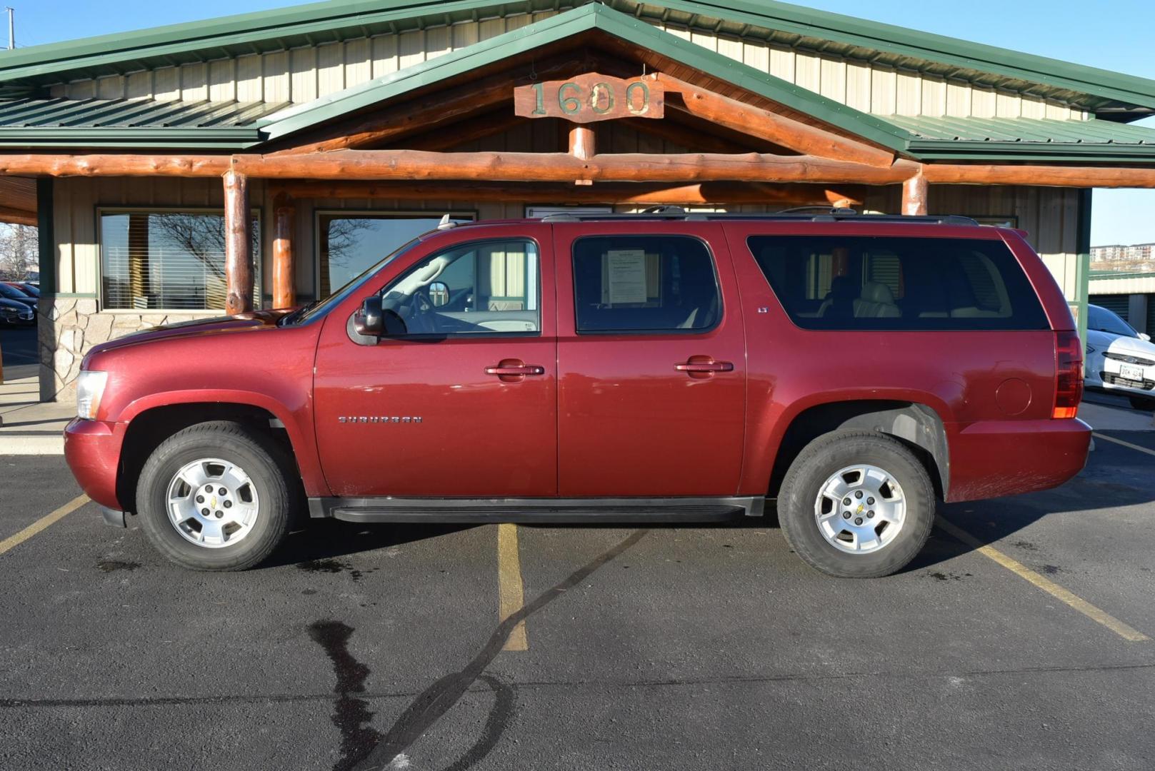 2009 Maroon /Tan Chevrolet Suburban LT (1GNFK26339J) with an 5.3L Vortec V8 SFI with Active Fuel Management engine, 6-Speed Automatic transmission, located at 1600 E Hwy 44, Rapid City, SD, 57703, (605) 716-7878, 44.070232, -103.171410 - Photo#3