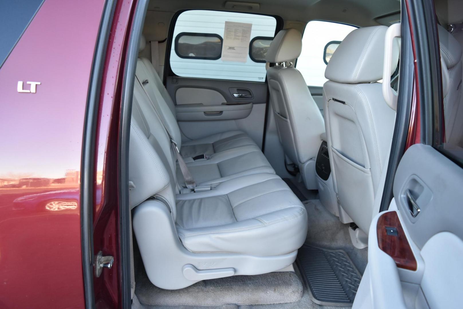 2009 Maroon /Tan Chevrolet Suburban LT (1GNFK26339J) with an 5.3L Vortec V8 SFI with Active Fuel Management engine, 6-Speed Automatic transmission, located at 1600 E Hwy 44, Rapid City, SD, 57703, (605) 716-7878, 44.070232, -103.171410 - Photo#10
