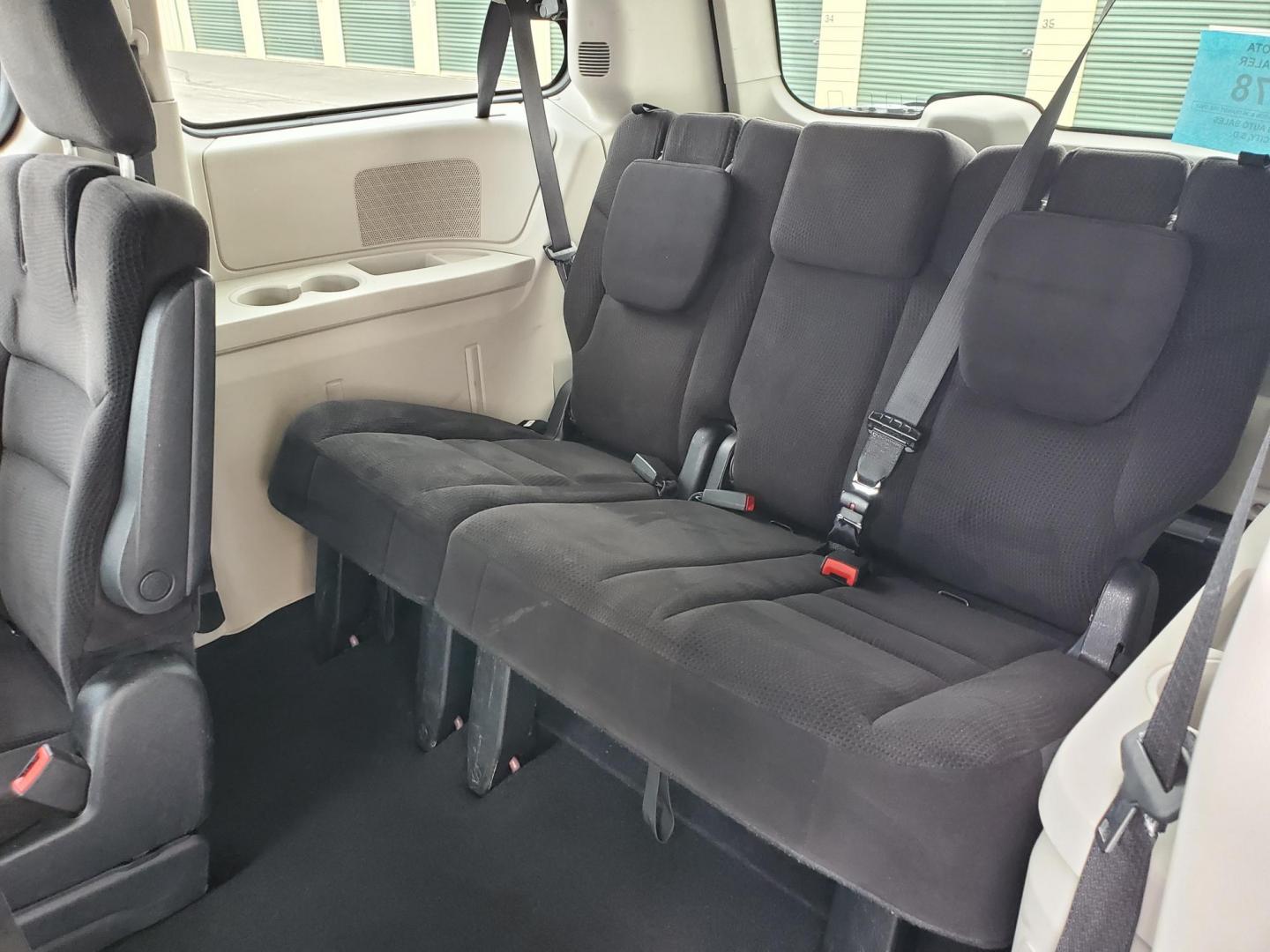 2014 Red /Black Dodge Grand Caravan SE (2C4RDGBG5ER) with an 3.6L V6 24V VVT engine, 6-Speed Automatic transmission, located at 1600 E Hwy 44, Rapid City, SD, 57703, (605) 716-7878, 44.070232, -103.171410 - Photo#12