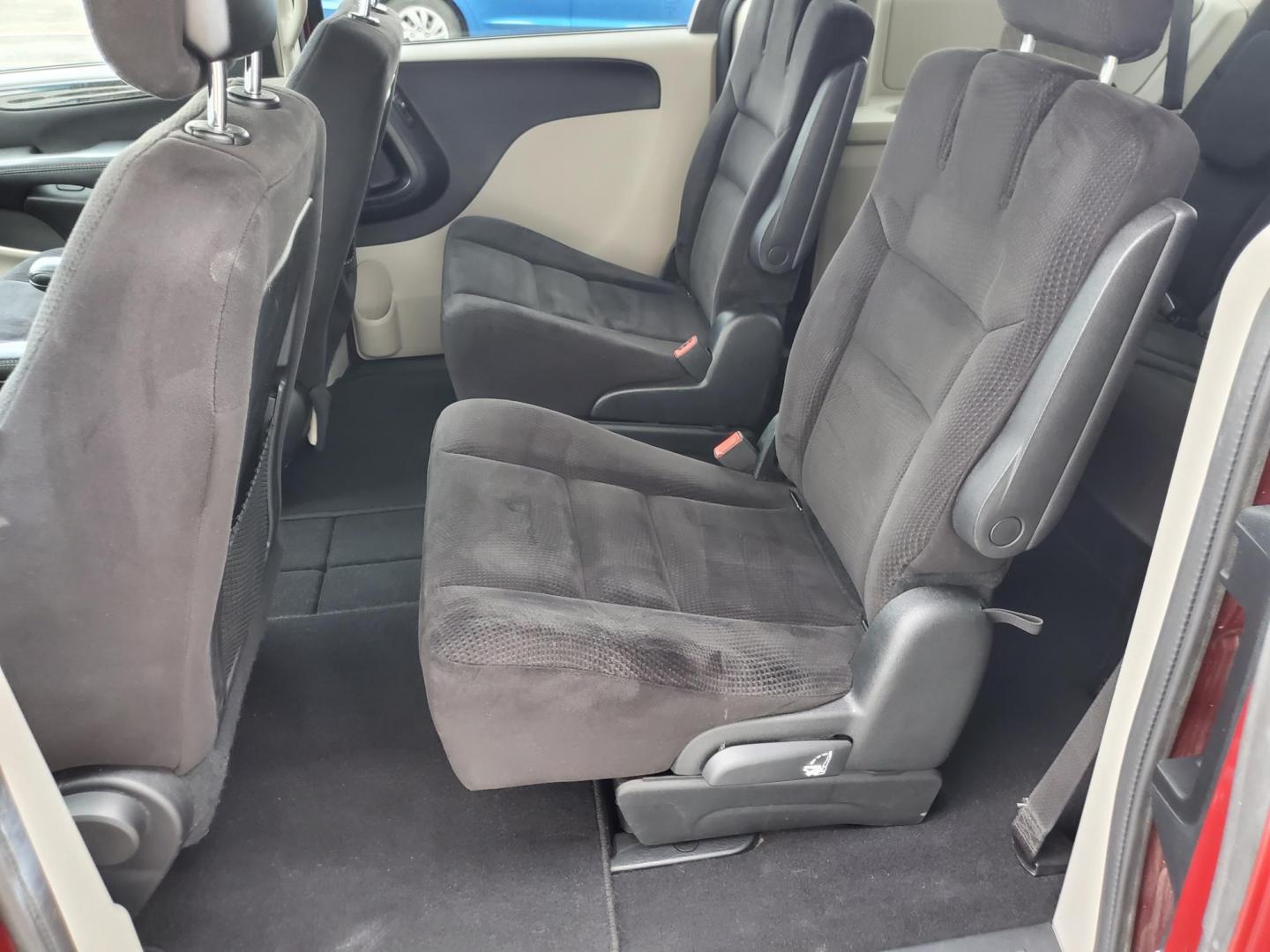 2014 Red /Black Dodge Grand Caravan SE (2C4RDGBG5ER) with an 3.6L V6 24V VVT engine, 6-Speed Automatic transmission, located at 1600 E Hwy 44, Rapid City, SD, 57703, (605) 716-7878, 44.070232, -103.171410 - Photo#14