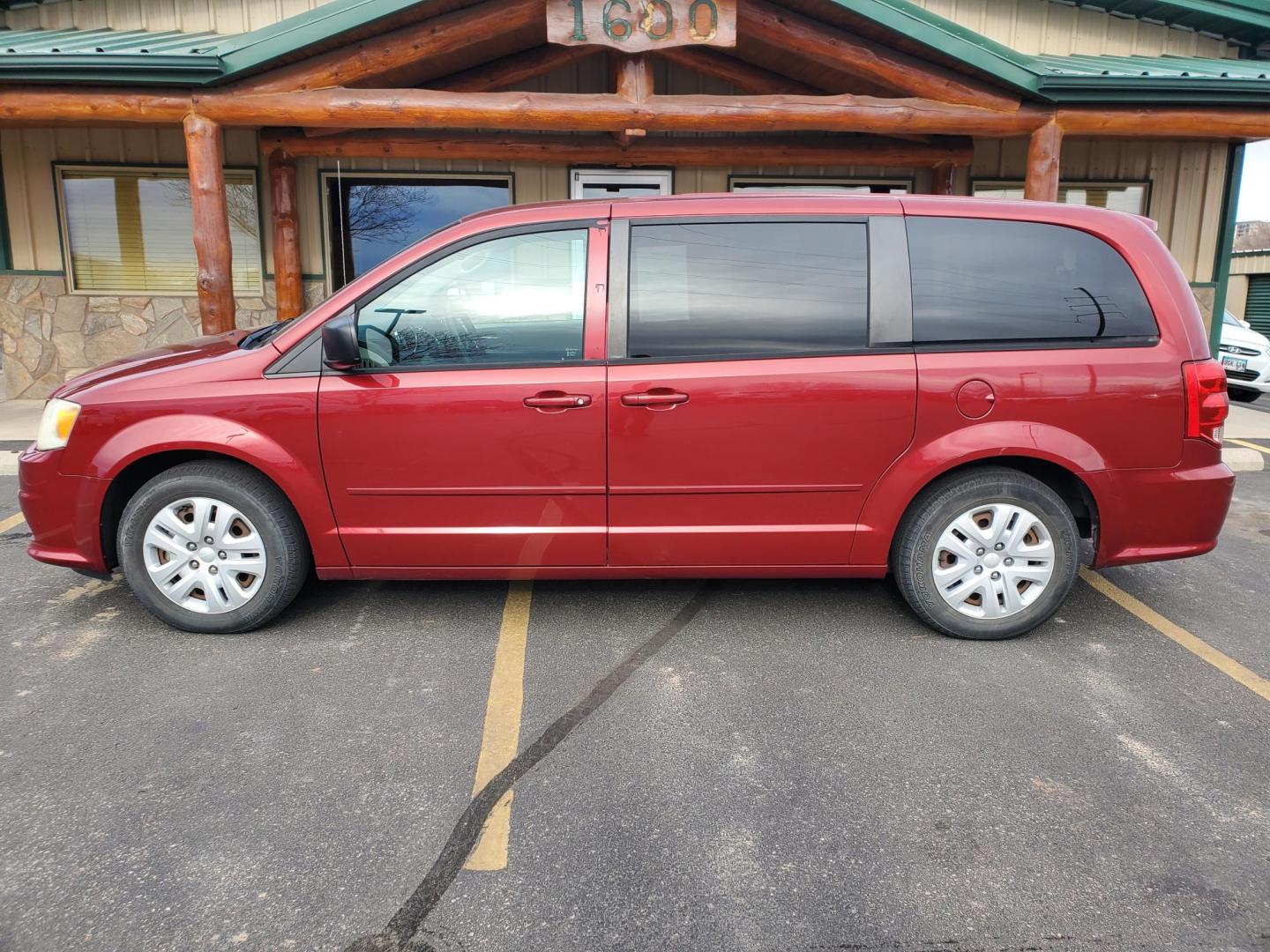 2014 Red /Black Dodge Grand Caravan SE (2C4RDGBG5ER) with an 3.6L V6 24V VVT engine, 6-Speed Automatic transmission, located at 1600 E Hwy 44, Rapid City, SD, 57703, (605) 716-7878, 44.070232, -103.171410 - Photo#2