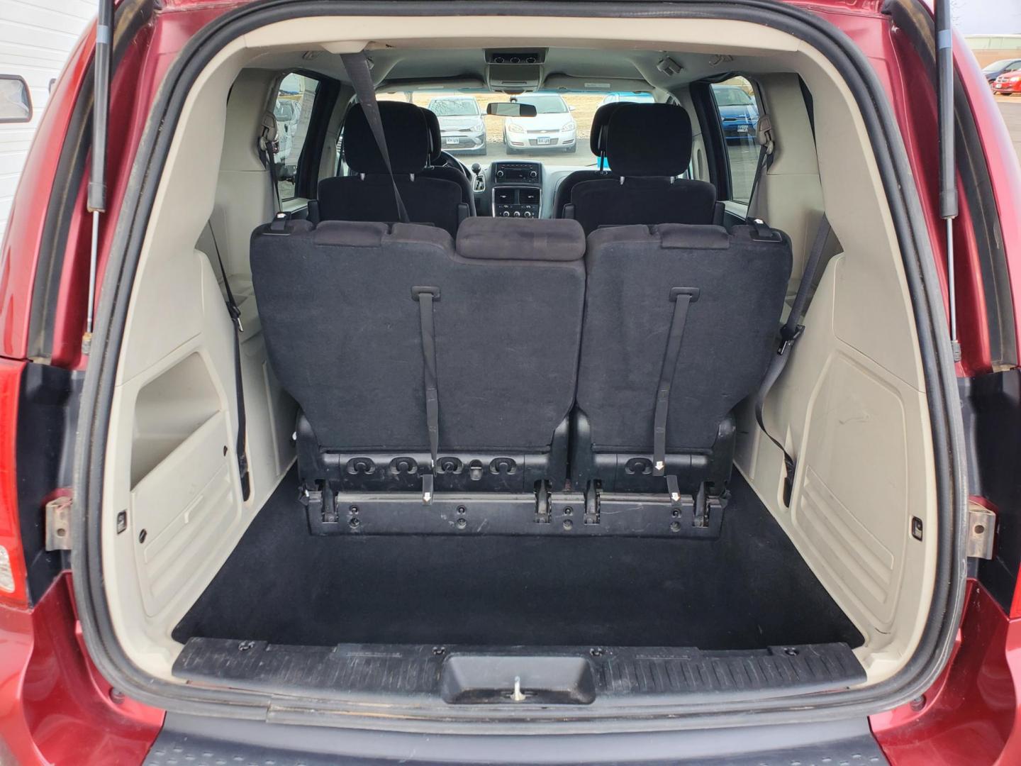 2014 Red /Black Dodge Grand Caravan SE (2C4RDGBG5ER) with an 3.6L V6 24V VVT engine, 6-Speed Automatic transmission, located at 1600 E Hwy 44, Rapid City, SD, 57703, (605) 716-7878, 44.070232, -103.171410 - Photo#24