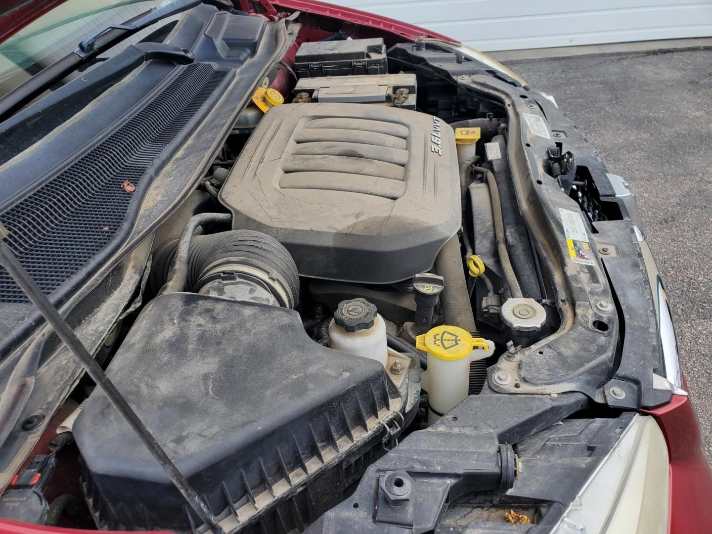 2014 Red /Black Dodge Grand Caravan SE (2C4RDGBG5ER) with an 3.6L V6 24V VVT engine, 6-Speed Automatic transmission, located at 1600 E Hwy 44, Rapid City, SD, 57703, (605) 716-7878, 44.070232, -103.171410 - Photo#27
