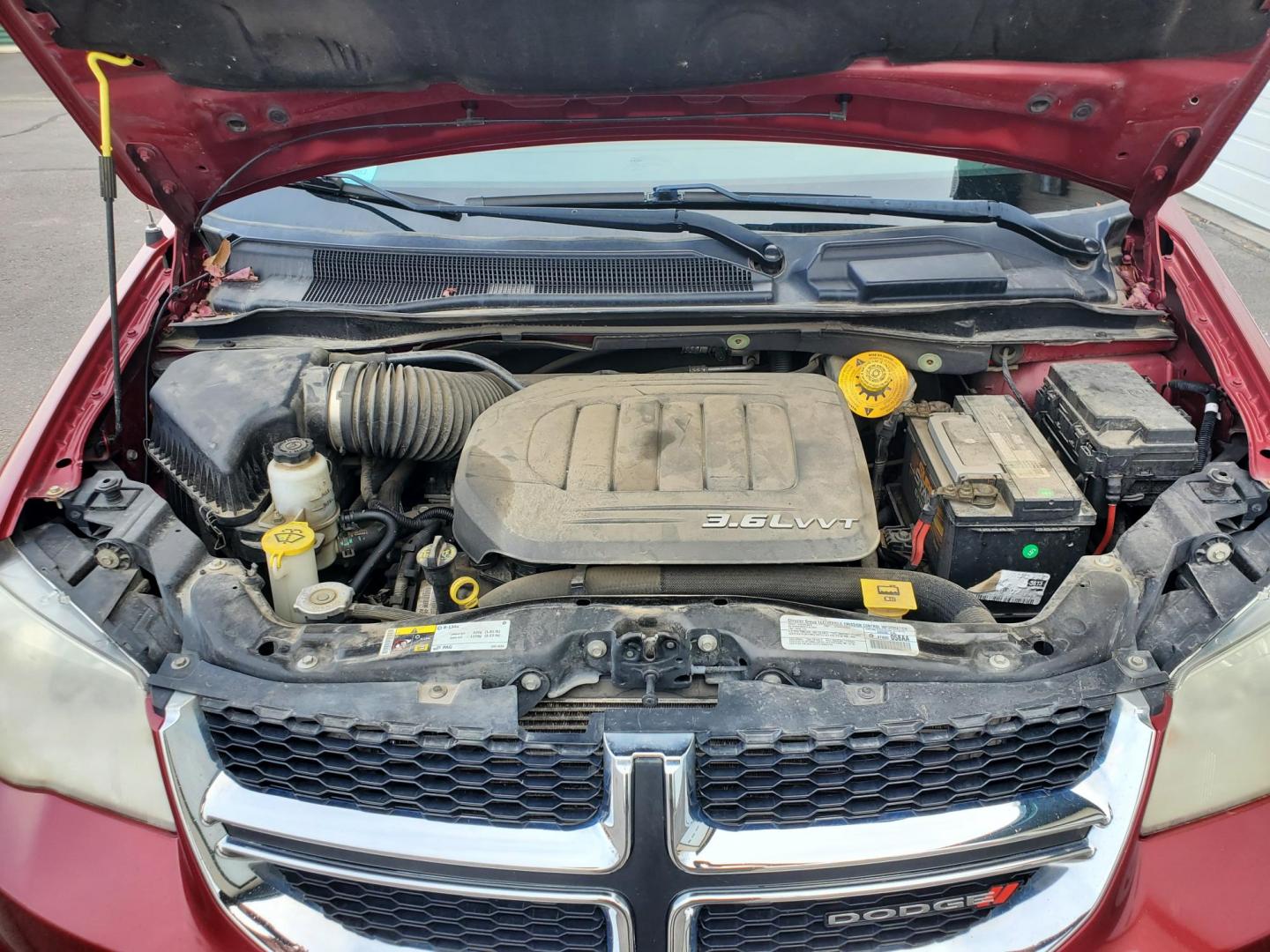 2014 Red /Black Dodge Grand Caravan SE (2C4RDGBG5ER) with an 3.6L V6 24V VVT engine, 6-Speed Automatic transmission, located at 1600 E Hwy 44, Rapid City, SD, 57703, (605) 716-7878, 44.070232, -103.171410 - Photo#28