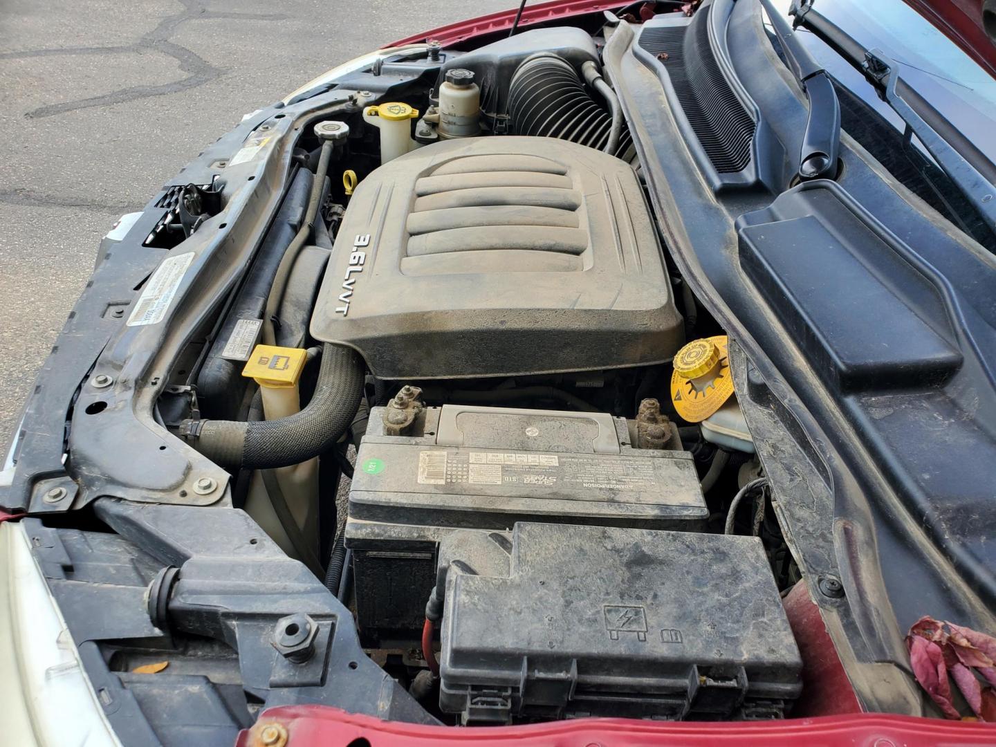 2014 Red /Black Dodge Grand Caravan SE (2C4RDGBG5ER) with an 3.6L V6 24V VVT engine, 6-Speed Automatic transmission, located at 1600 E Hwy 44, Rapid City, SD, 57703, (605) 716-7878, 44.070232, -103.171410 - Photo#29