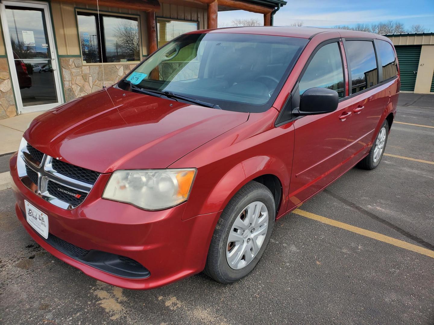 2014 Red /Black Dodge Grand Caravan SE (2C4RDGBG5ER) with an 3.6L V6 24V VVT engine, 6-Speed Automatic transmission, located at 1600 E Hwy 44, Rapid City, SD, 57703, (605) 716-7878, 44.070232, -103.171410 - Photo#3