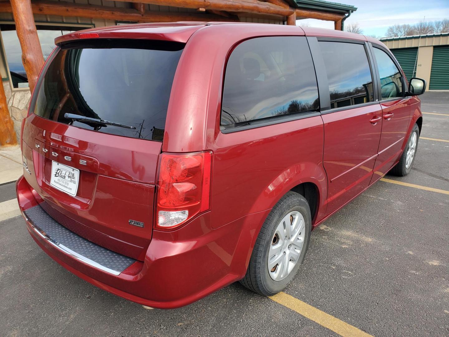 2014 Red /Black Dodge Grand Caravan SE (2C4RDGBG5ER) with an 3.6L V6 24V VVT engine, 6-Speed Automatic transmission, located at 1600 E Hwy 44, Rapid City, SD, 57703, (605) 716-7878, 44.070232, -103.171410 - Photo#7