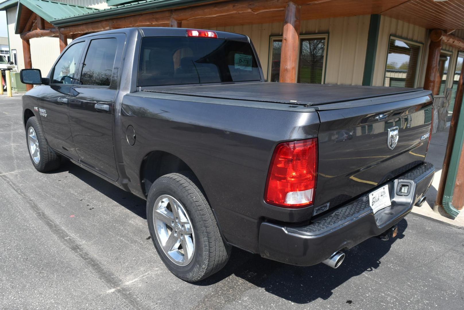 2017 Gray Ram 1500 Express (3C6RR7KT6HG) with an 5.7L V8 HEMI MDS VV engine, 8-Speed Automatic transmission, located at 1600 E Hwy 44, Rapid City, SD, 57703, (605) 716-7878, 44.070232, -103.171410 - Photo#5