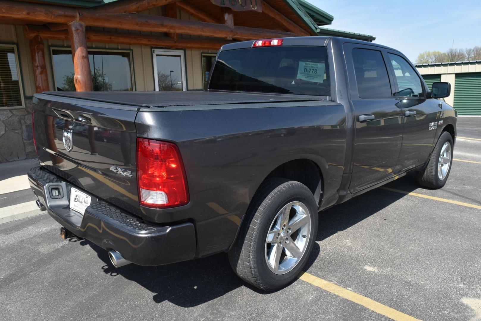 2017 Gray Ram 1500 Express (3C6RR7KT6HG) with an 5.7L V8 HEMI MDS VV engine, 8-Speed Automatic transmission, located at 1600 E Hwy 44, Rapid City, SD, 57703, (605) 716-7878, 44.070232, -103.171410 - Photo#7