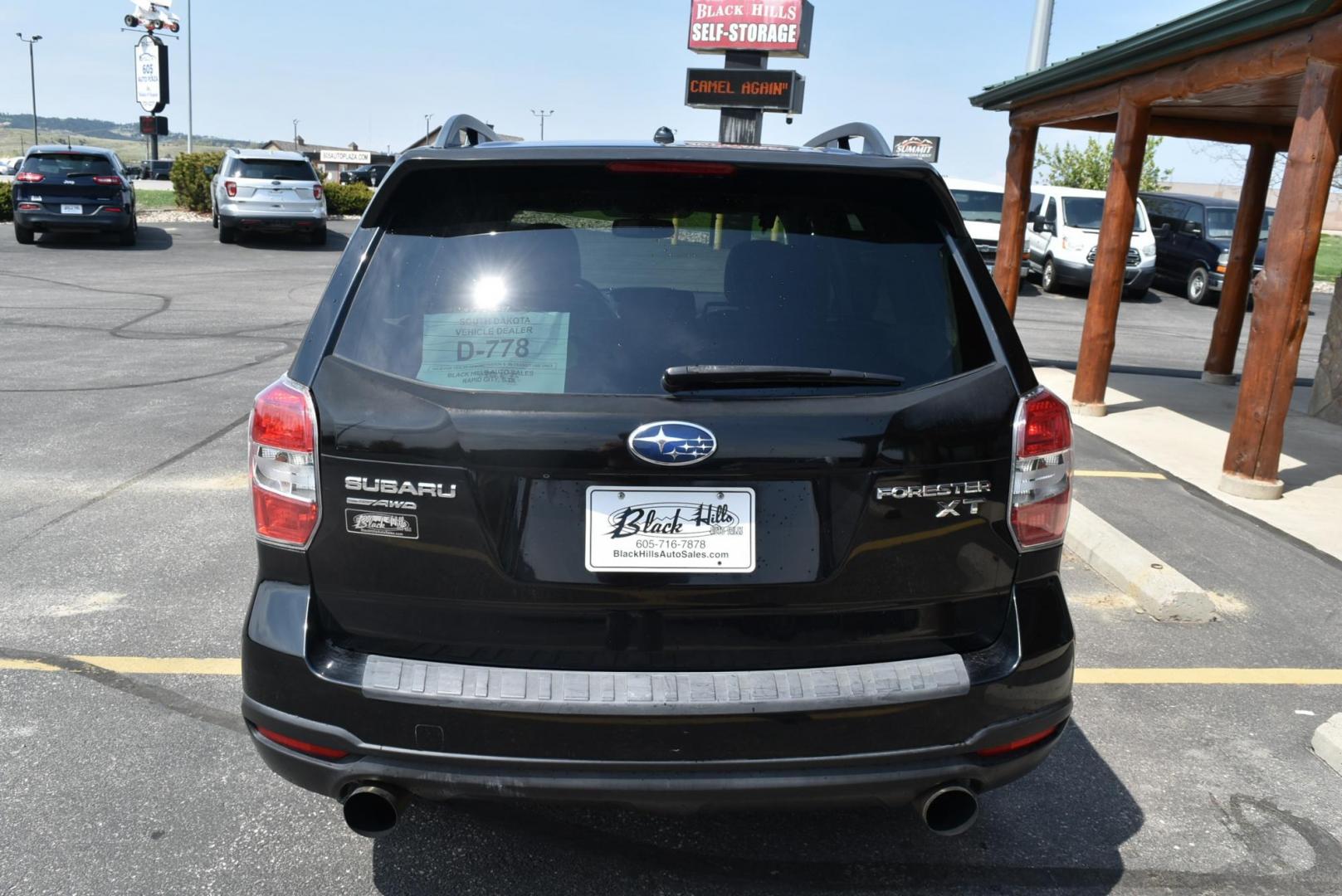 2014 Black /Black Subaru Forester XT Premium (JF2SJGDC2EH) with an 2.0 L Intercooled Turbo Premium Unleaded H-4 engine, 8-speed CVT w/OD transmission, located at 1600 E Hwy 44, Rapid City, SD, 57703, (605) 716-7878, 44.070232, -103.171410 - Photo#6
