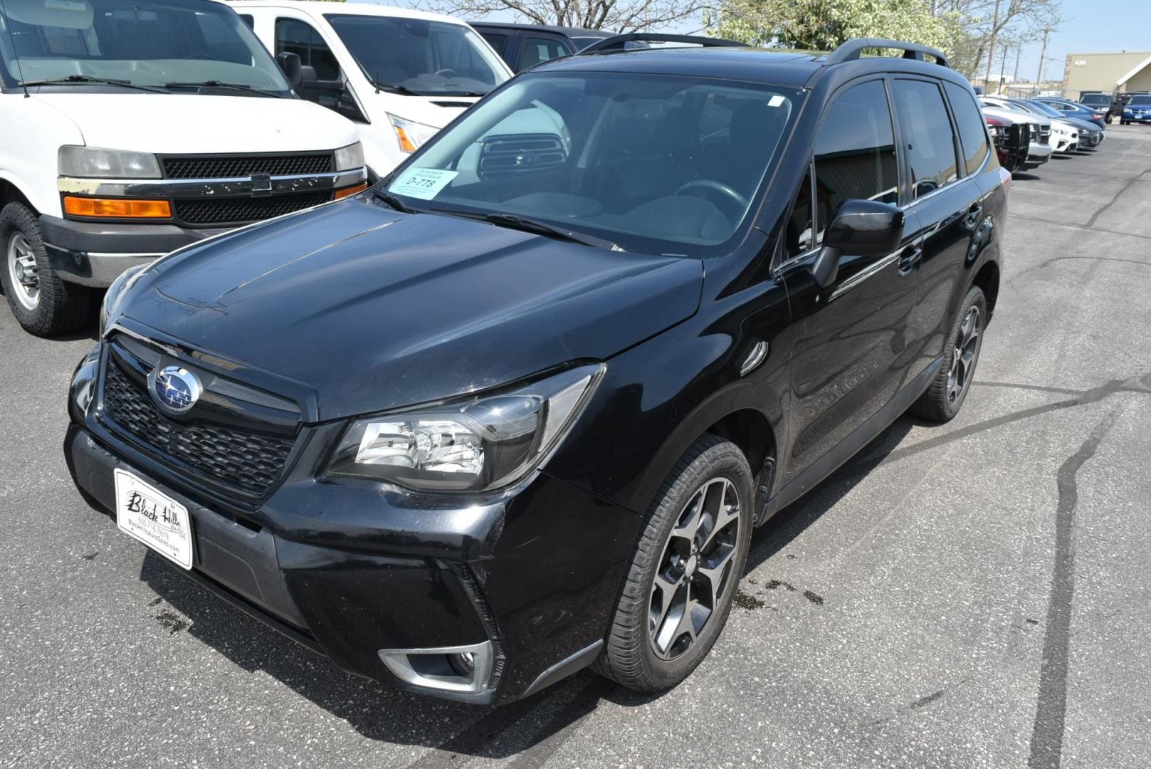 2014 Black /Black Subaru Forester XT Premium (JF2SJGDC2EH) with an 2.0 L Intercooled Turbo Premium Unleaded H-4 engine, 8-speed CVT w/OD transmission, located at 1600 E Hwy 44, Rapid City, SD, 57703, (605) 716-7878, 44.070232, -103.171410 - Photo#2