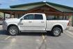 2016 White /Lt Brown Ram 2500 Laramie (3C6UR5FL2GG) with an 6.7L I6 CUMMINS TURBO DIESEL engine, 6-Speed Automatic transmission, located at 1600 E Hwy 44, Rapid City, SD, 57703, (605) 716-7878, 44.070232, -103.171410 - Photo#3