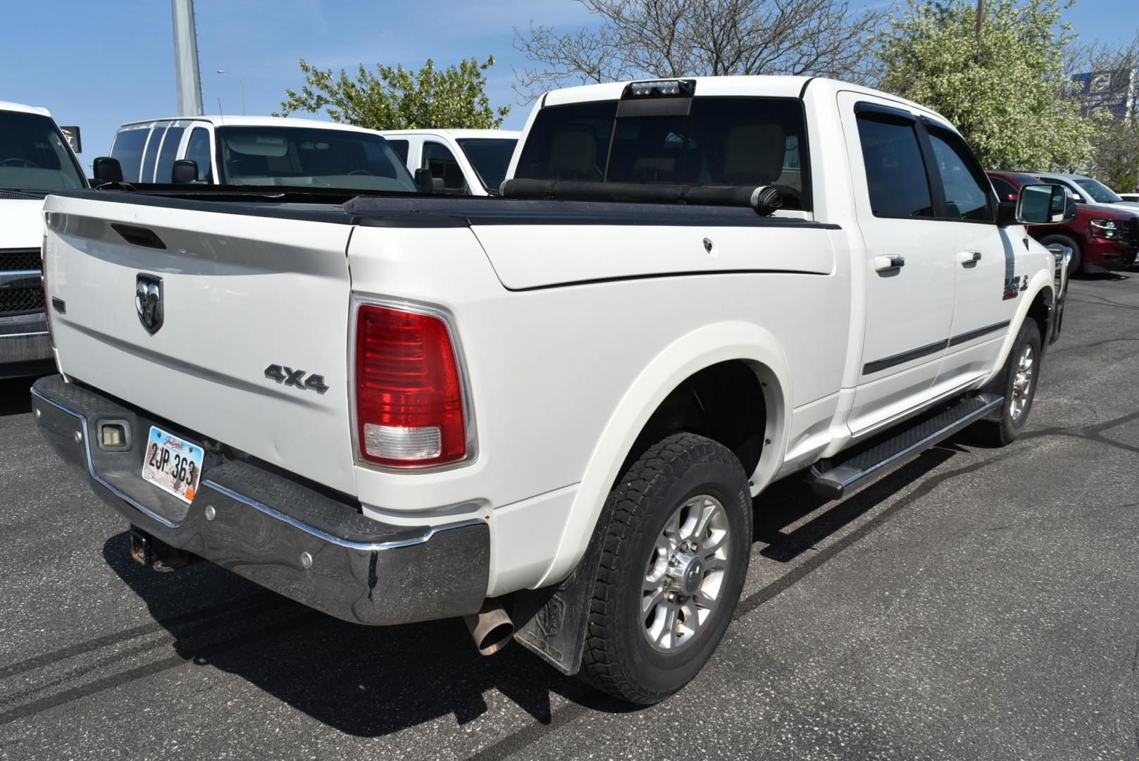 2016 White /Lt Brown Ram 2500 Laramie (3C6UR5FL2GG) with an 6.7L I6 CUMMINS TURBO DIESEL engine, 6-Speed Automatic transmission, located at 1600 E Hwy 44, Rapid City, SD, 57703, (605) 716-7878, 44.070232, -103.171410 - Photo#7