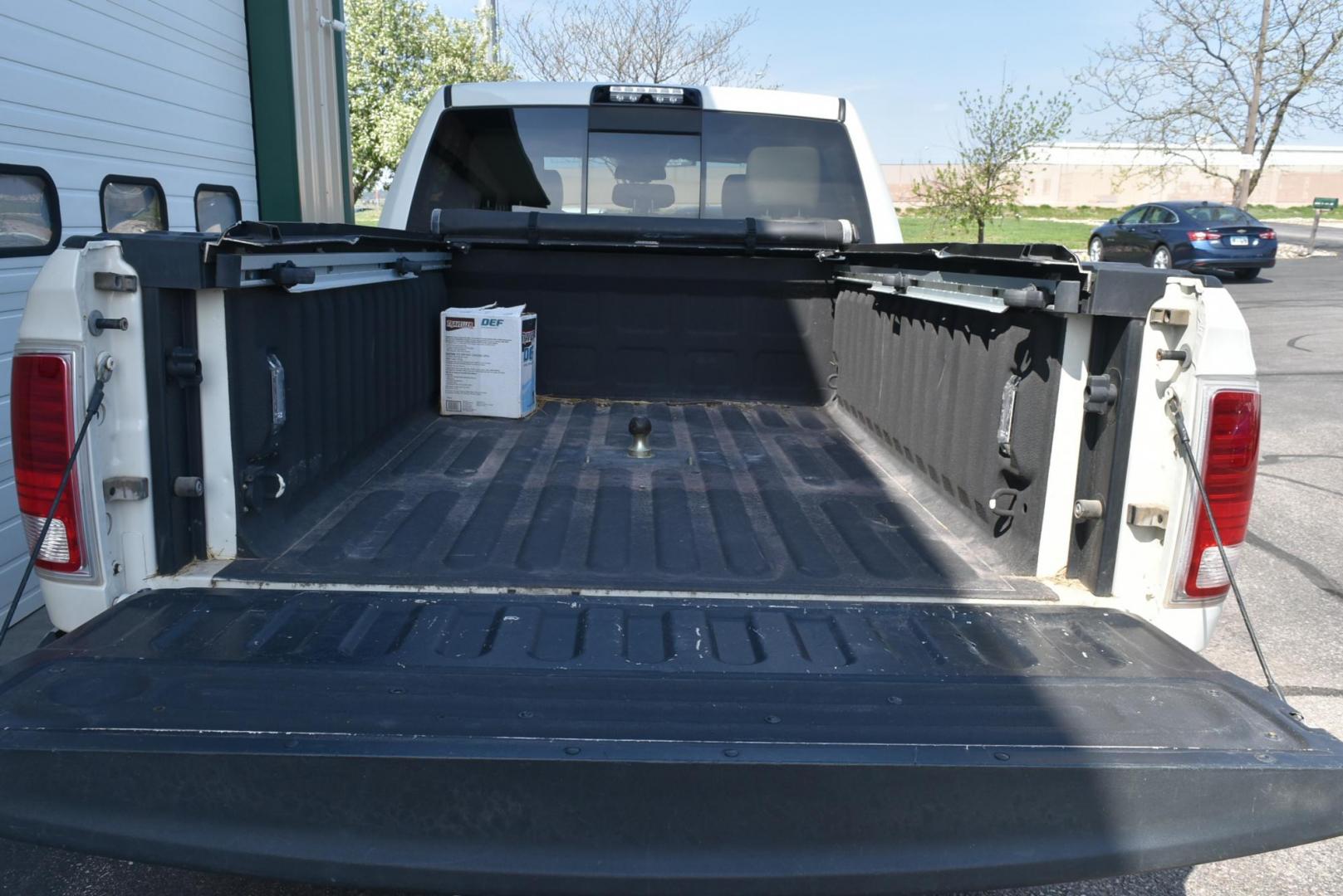 2016 White /Lt Brown Ram 2500 Laramie (3C6UR5FL2GG) with an 6.7L I6 CUMMINS TURBO DIESEL engine, 6-Speed Automatic transmission, located at 1600 E Hwy 44, Rapid City, SD, 57703, (605) 716-7878, 44.070232, -103.171410 - Photo#31